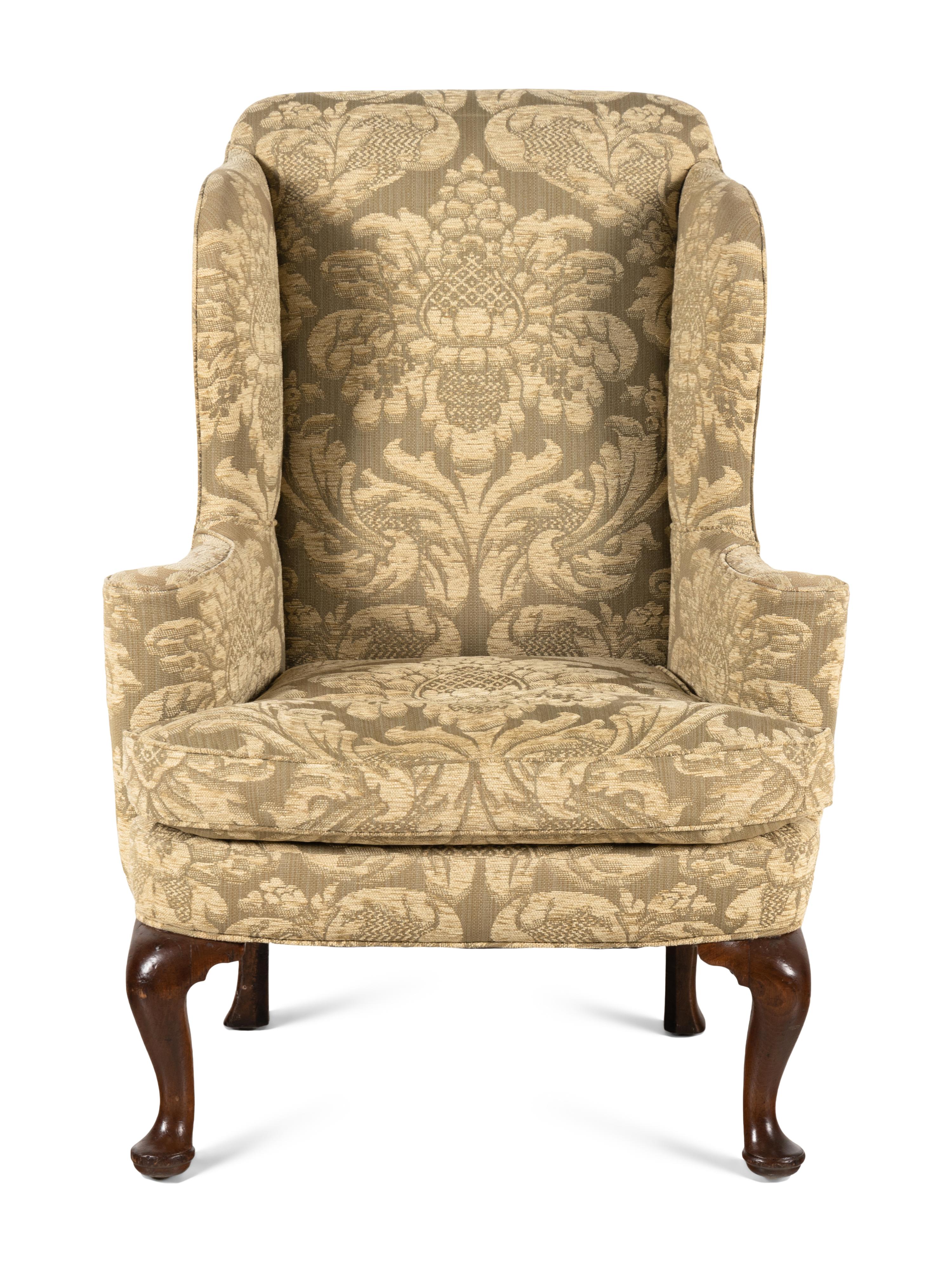 A George II Walnut Wingback Armchair