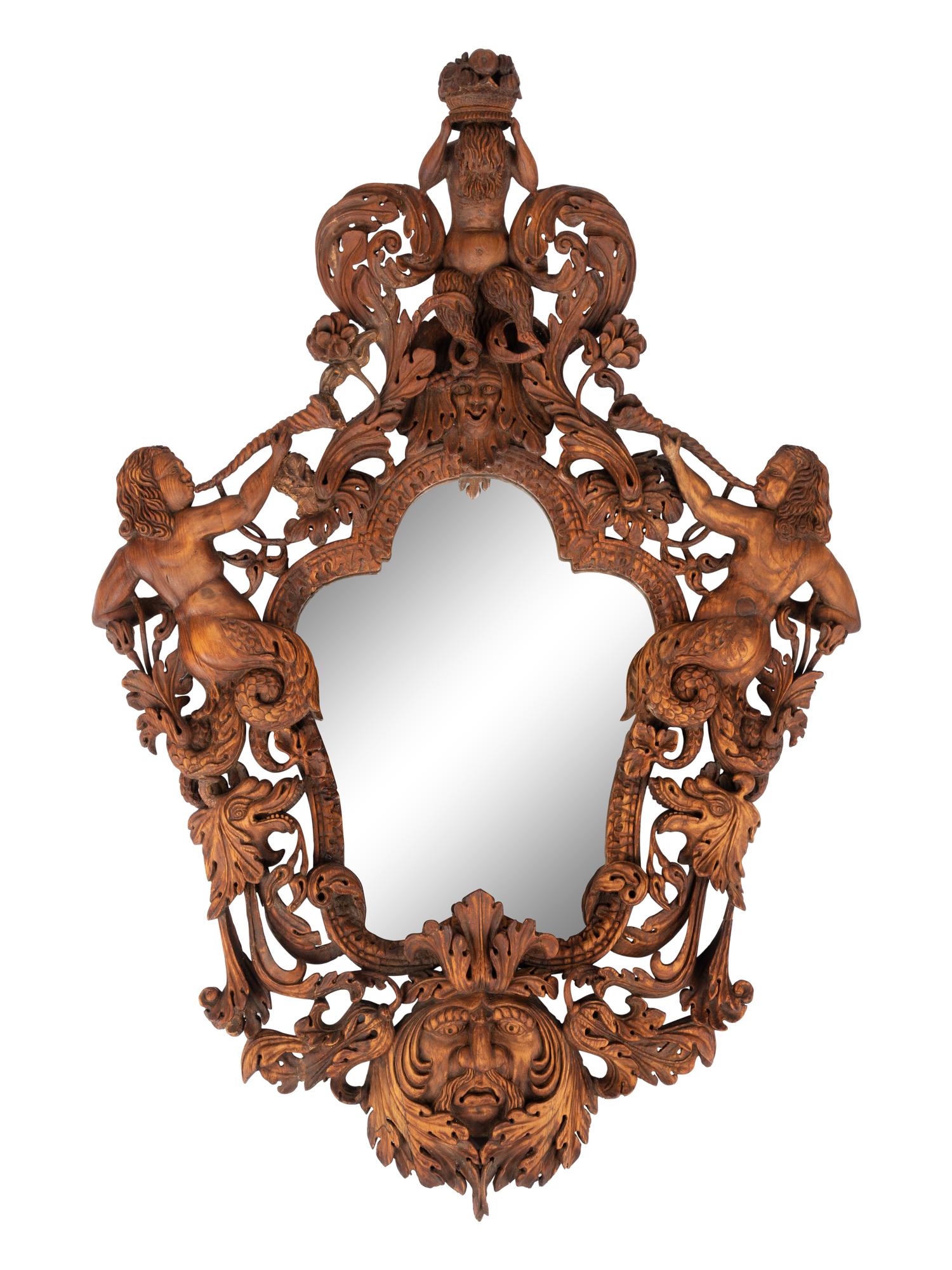 An Italian Carved Walnut Mirror in the Manner of Valentino Besarel