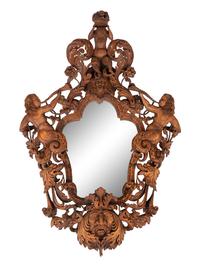 An Italian Carved Walnut Mirror in the Manner of Valentino Besarel