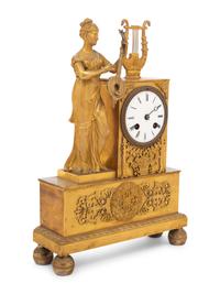 A French Gilt Bronze Figural Mantel Clock