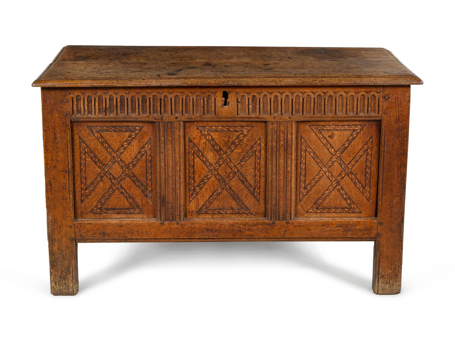 A Charles II Carved and Paneled Oak Coffer