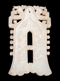 A Celadon Jade Bell-Form Pendant