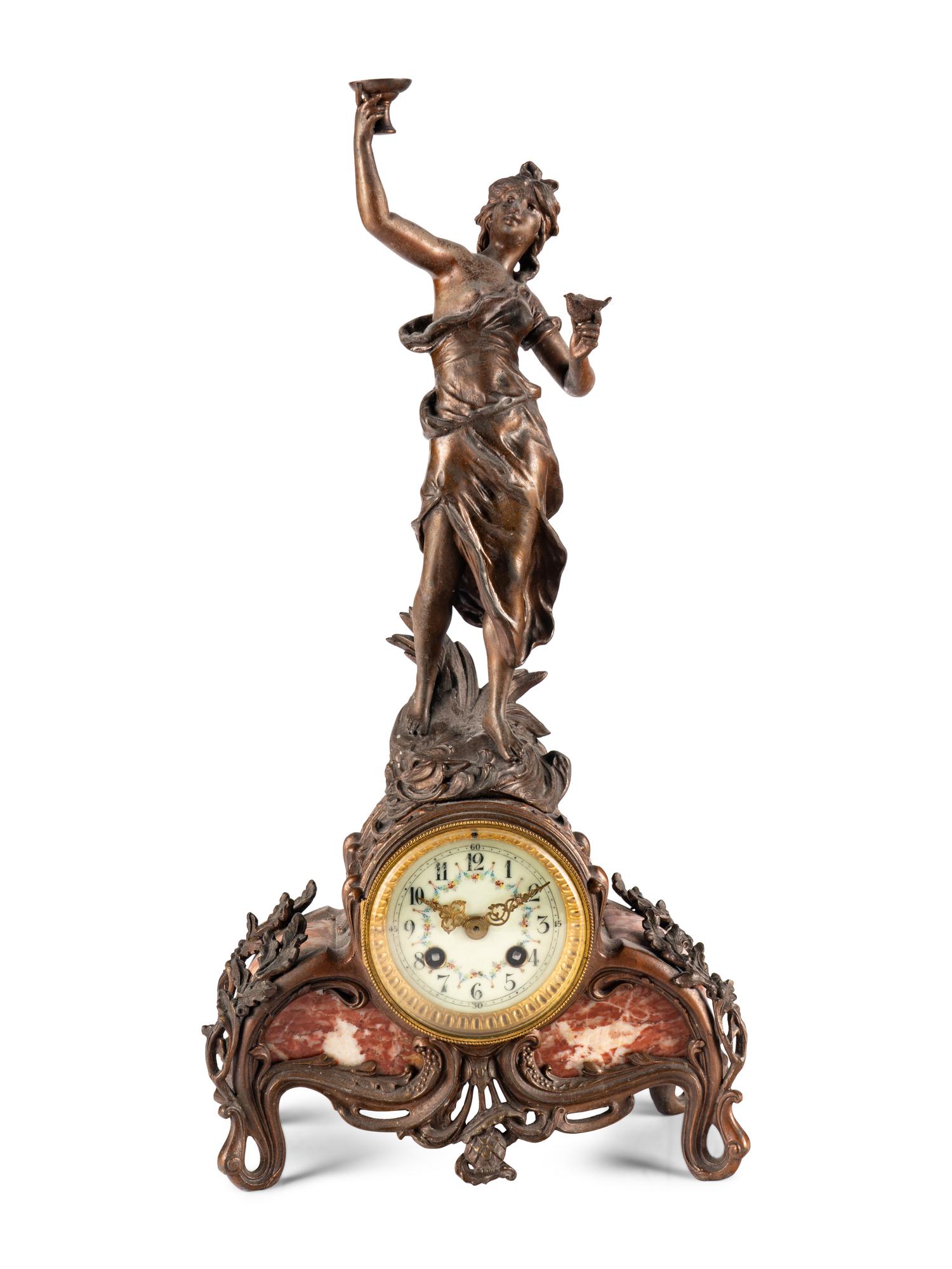 A French Cast Metal and Marble Figural Clock