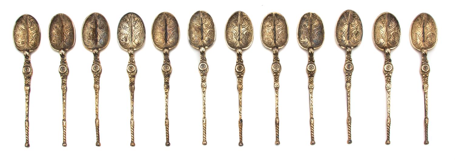 A Set of Twelve English Silver Demitasse Spoons, Thomas Bradbury & Sons, Sheffield, 1936, having turned handle and foliate-form decorat