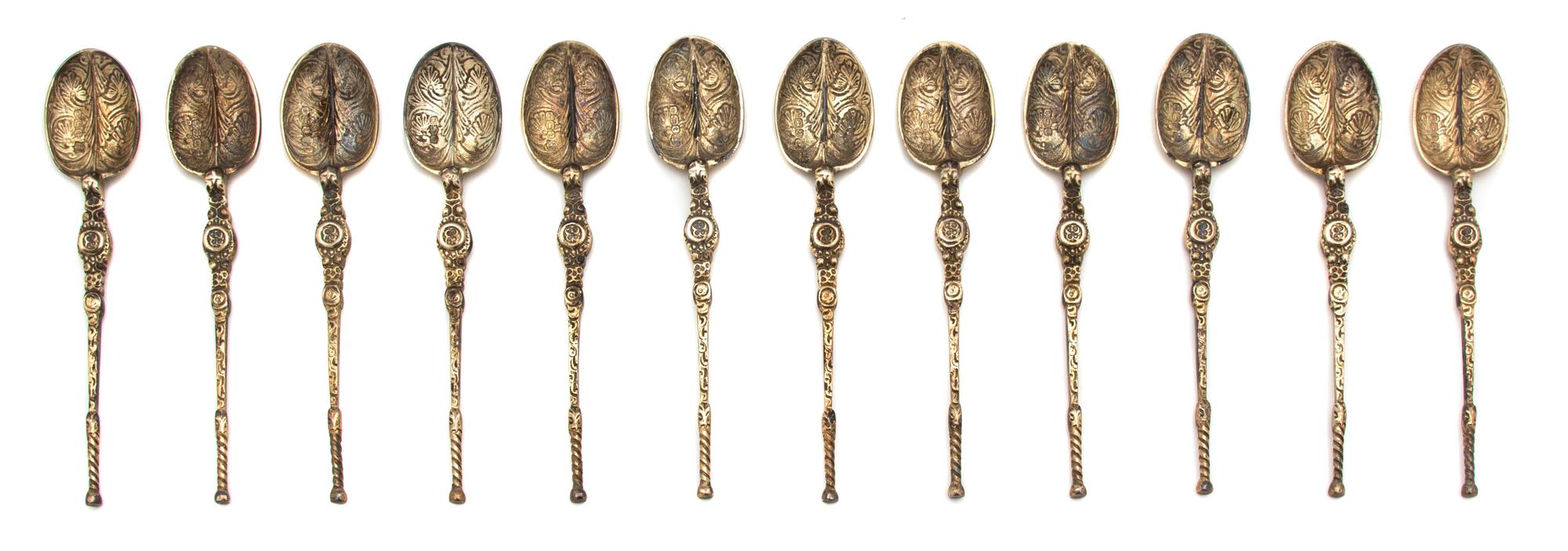 A Set of Twelve English Silver Demitasse Spoons, Thomas Bradbury & Sons, Sheffield, 1936, having turned handle and foliate-form decorat