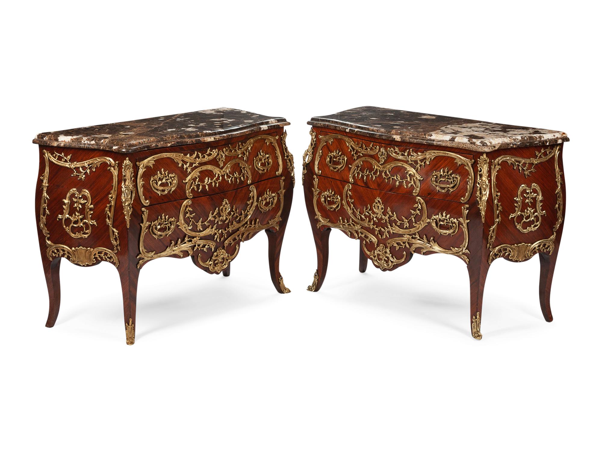 A Pair of Louis XV Style Gilt Bronze Mounted Commodes