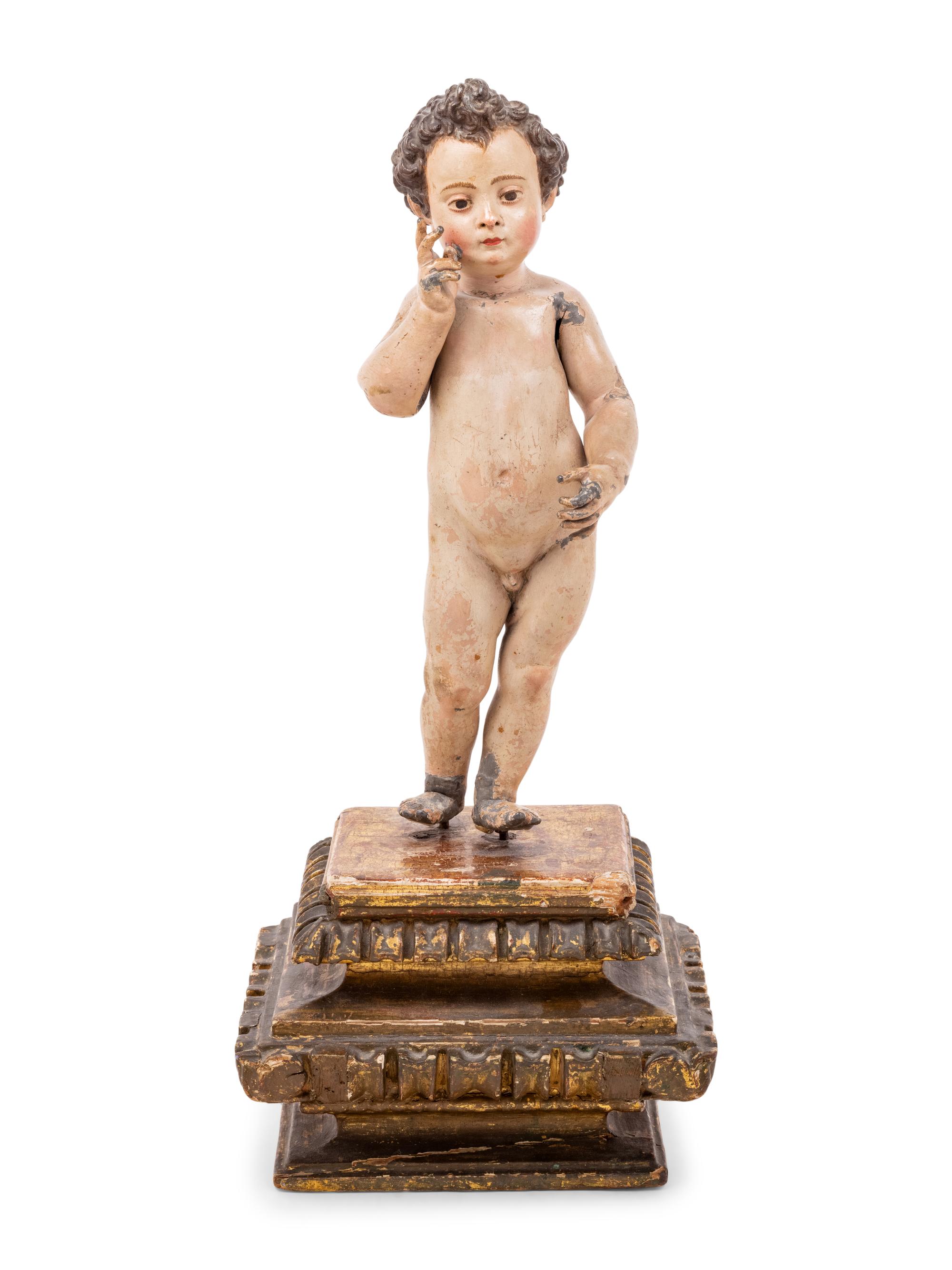 An Italian Painted Putto Figure
