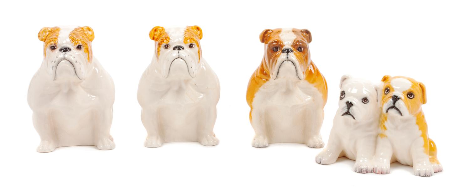 A Group of Four Royal Doulton Bulldogs Height of tallest 5 inches.