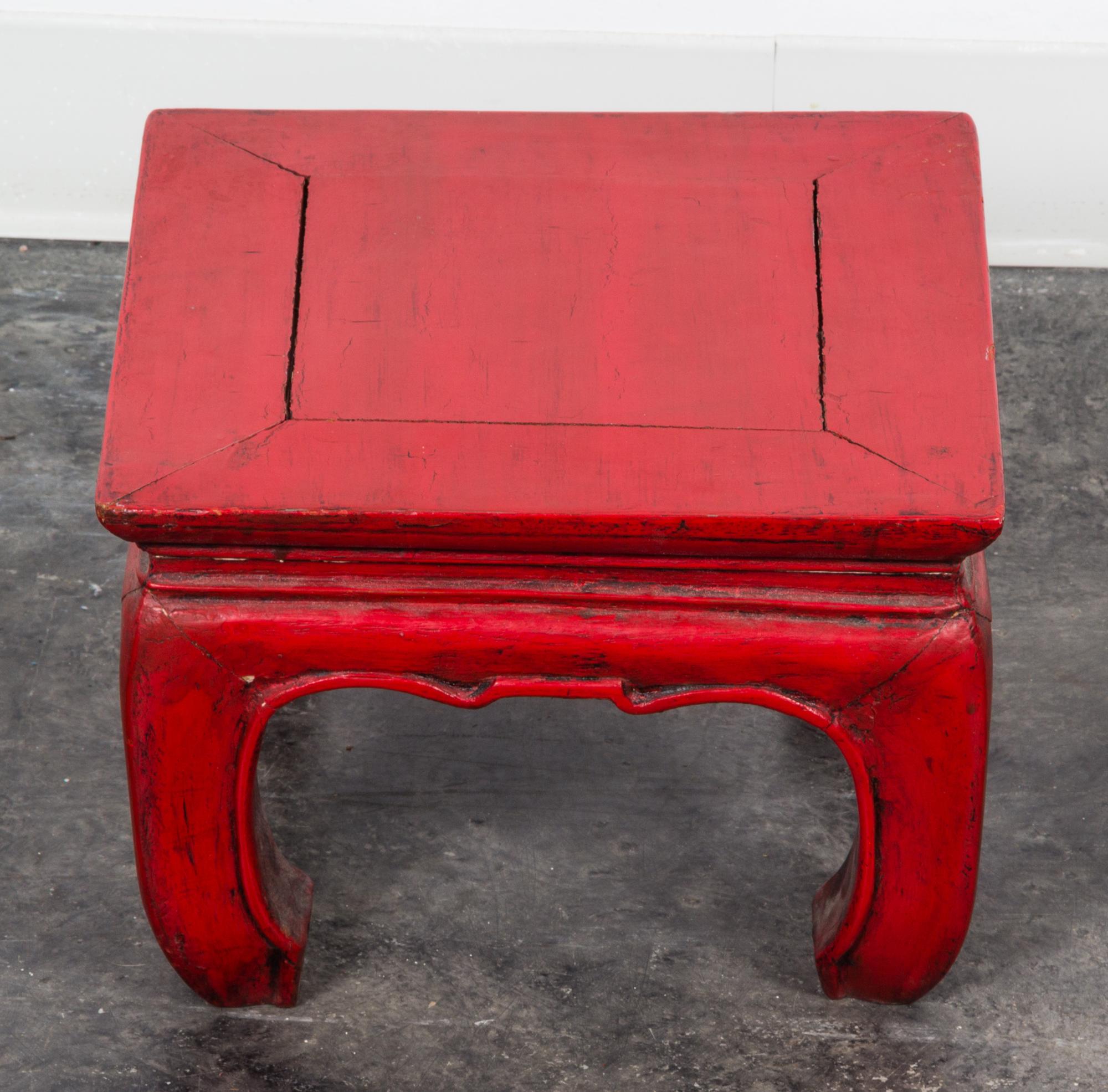 A Chinese Red Lacquered Wood Foot Stool Height 9 x width 12 1/4 inches.