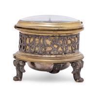 A German Gilt Metal and Silvered Brass Table Clock