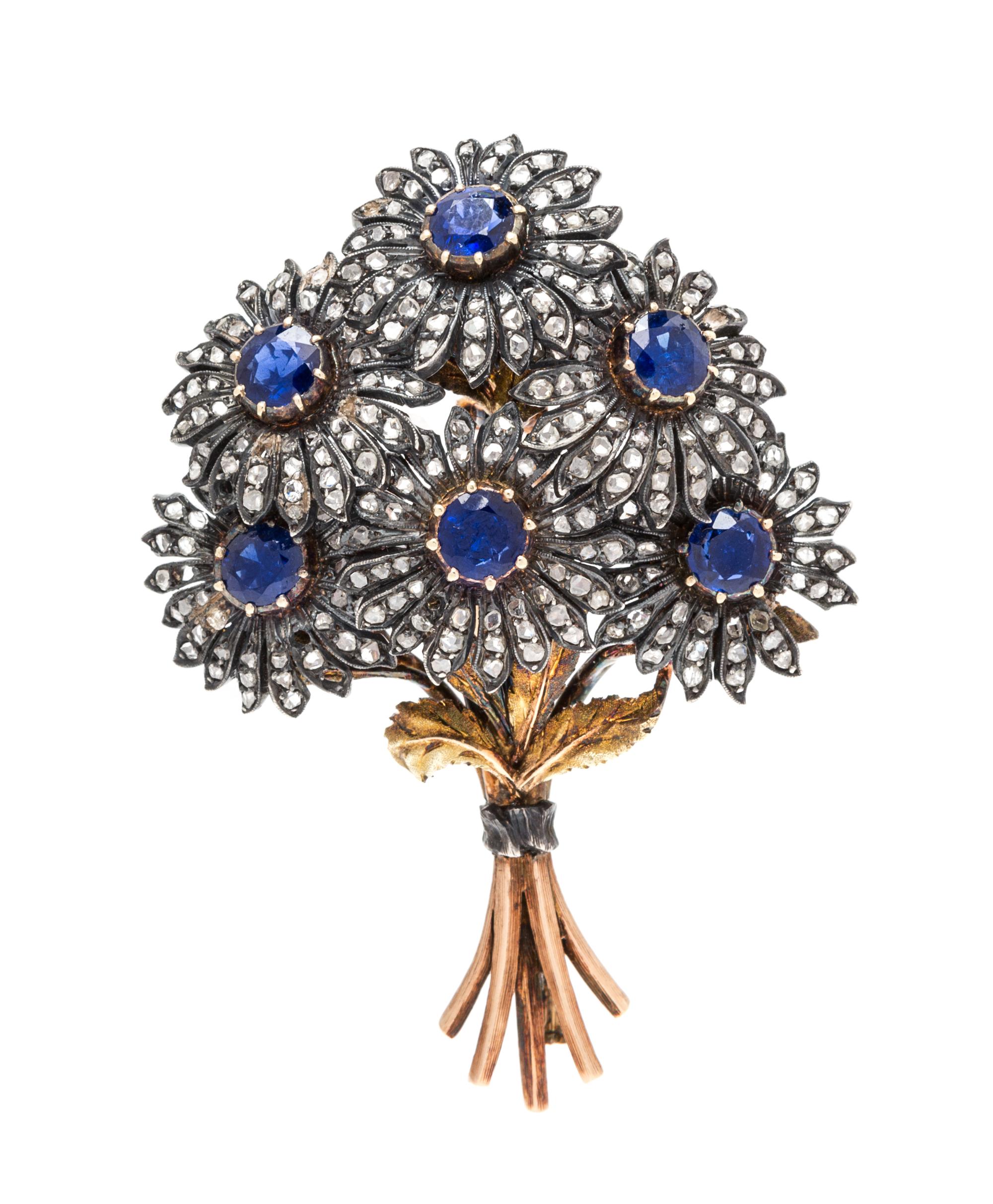A Silver Topped Gold, Sapphire and Diamond Floral Motif Brooch, Buccellati, 15.05 dwts.