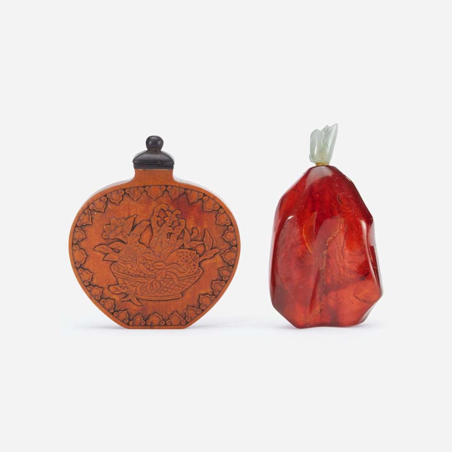 One Chinese bamboo veneer and one amber snuff bottle