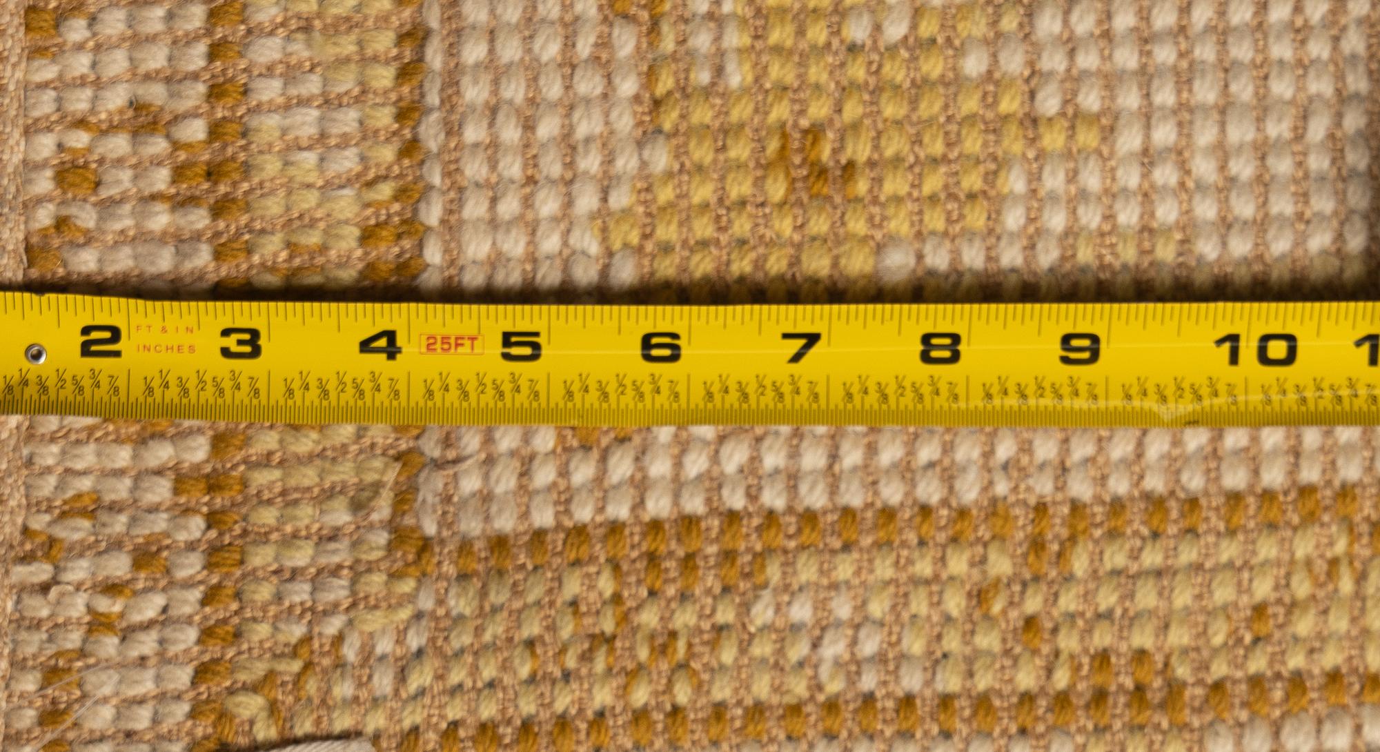 A Portuguese Needlepoint Rug