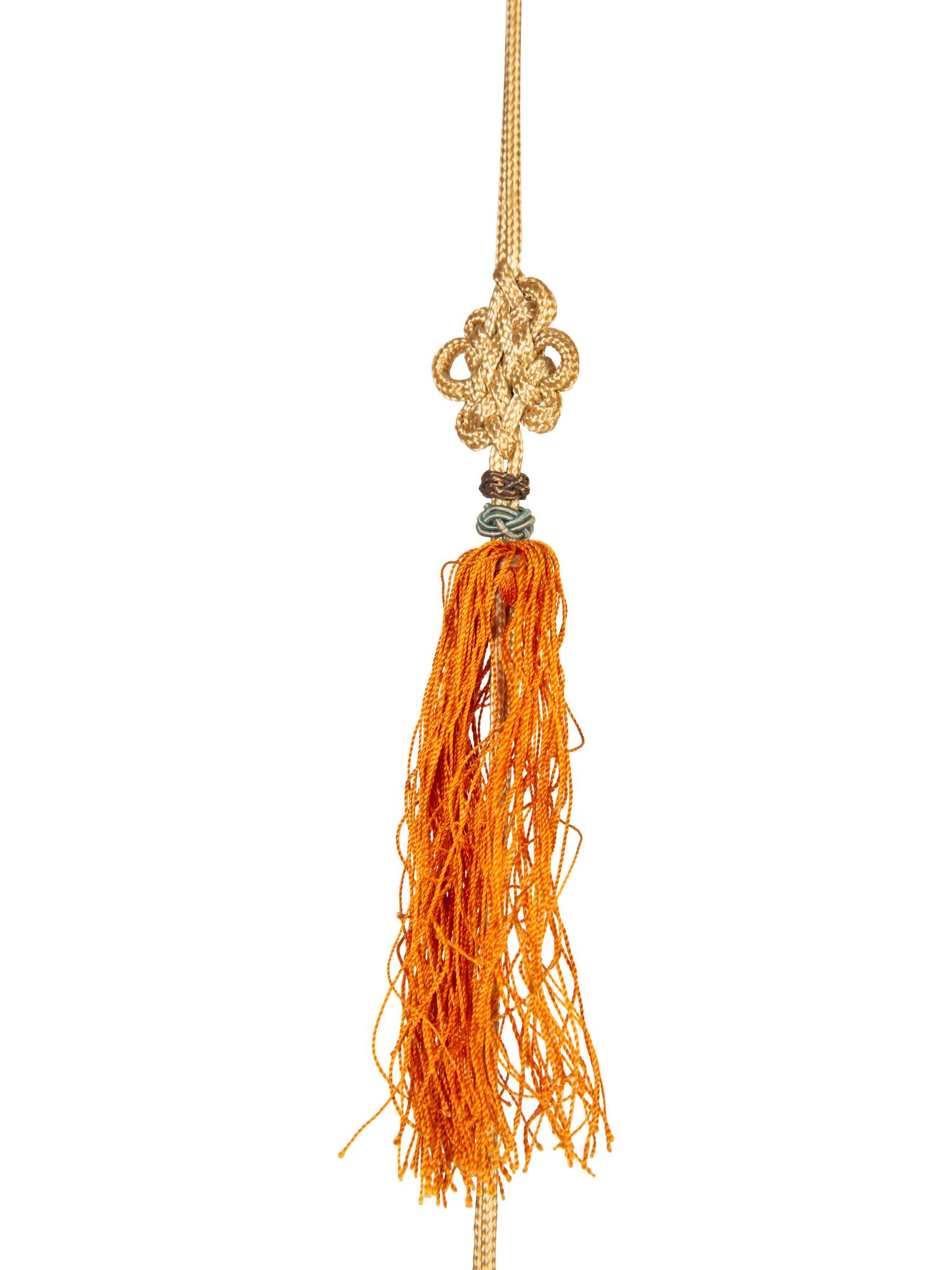 A Pair of Carved Jade Medallion and Tasseled Wall Hangings