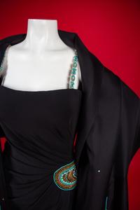 Christian Dior Haute Couture Dress and Shawl, 2008 — In 2008, Renée Fleming was the first woman to open the season of New York’s Metropolitan Opera. For the occasion, she wore four haute couture creations, including this dress by John Galliano for Christian Dior for her role as The Countess in Strauss’s Capriccio. Annie Lebovitz photographed Fleming in all four dresses for a 2008 Vogue article called ‘La Dolce Vida’ by Hamish Bowles. In the article, Galliano is quote as saying that Fleming’s voice, with its ‘whole timbre of colors, emotions, and tones, made me want to create something bold, vivacious, sensual, and capricious.’