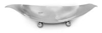 An American Silver Dish, Tiffany & Co., New York, NY, of oval form with flared edges and raised on four ball feet.