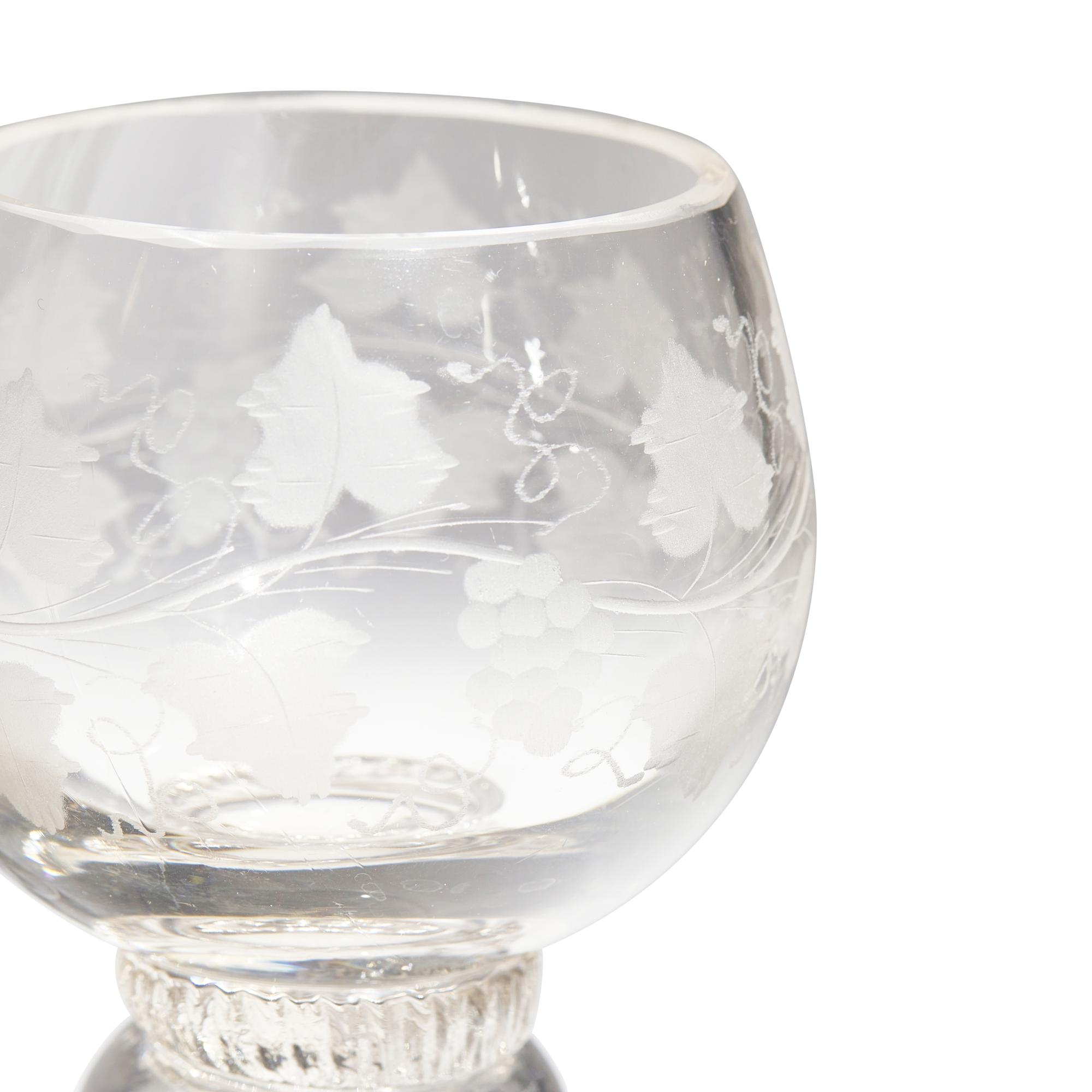 A Set of Eight Blown and Etched Glass Wine Glasses