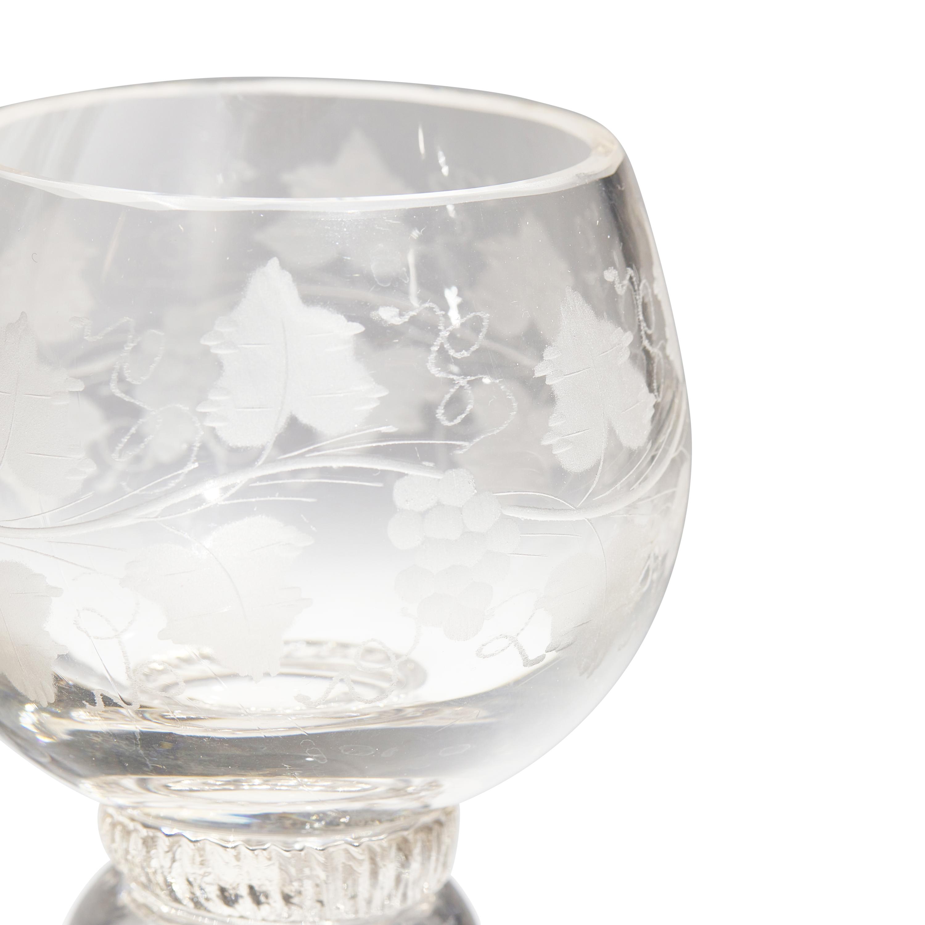 A Set of Eight Blown and Etched Glass Wine Glasses