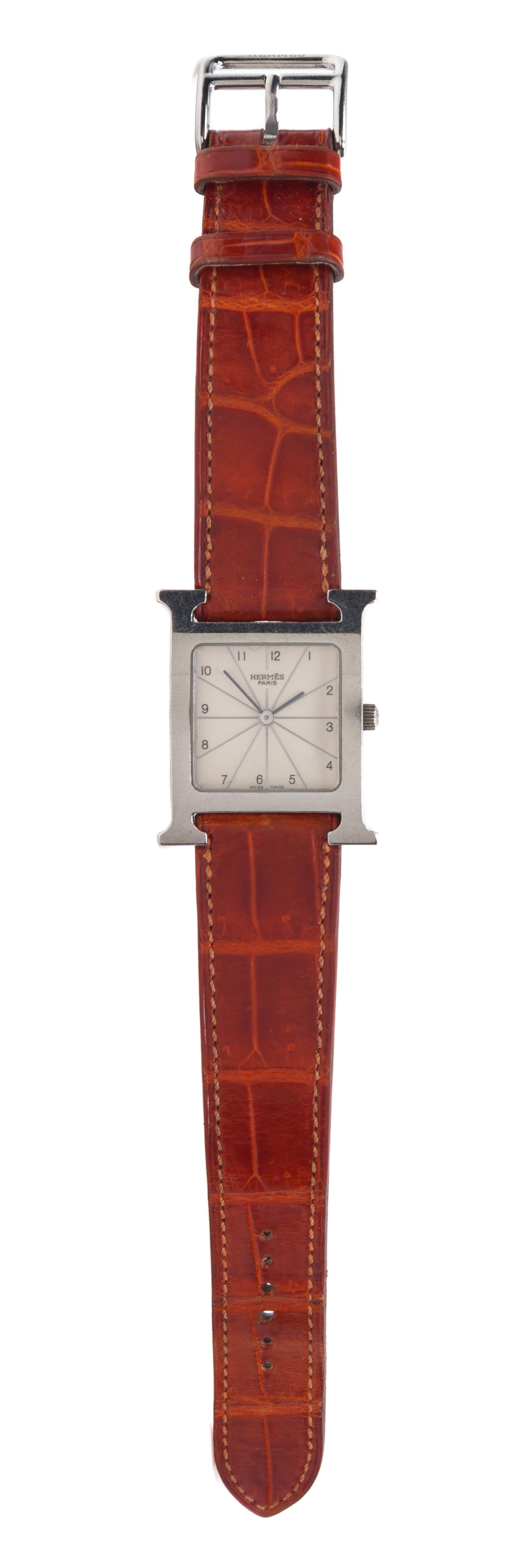 An Hermes Stainless Steel Heure H Wristwatch, Size PM, 9" x 1".