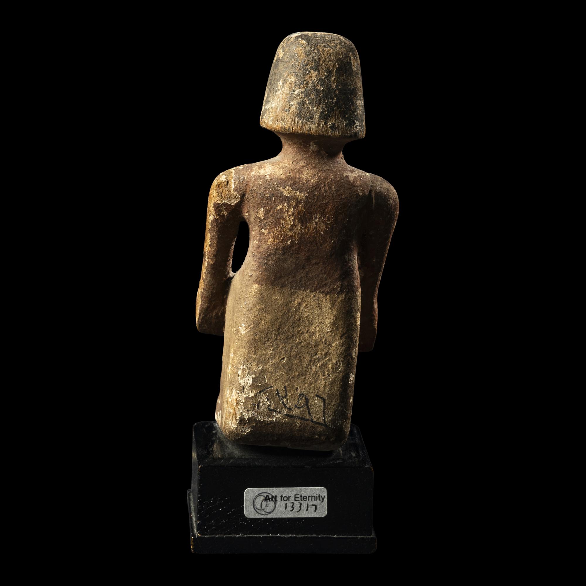 An Egyptian Painted Wood Boatman