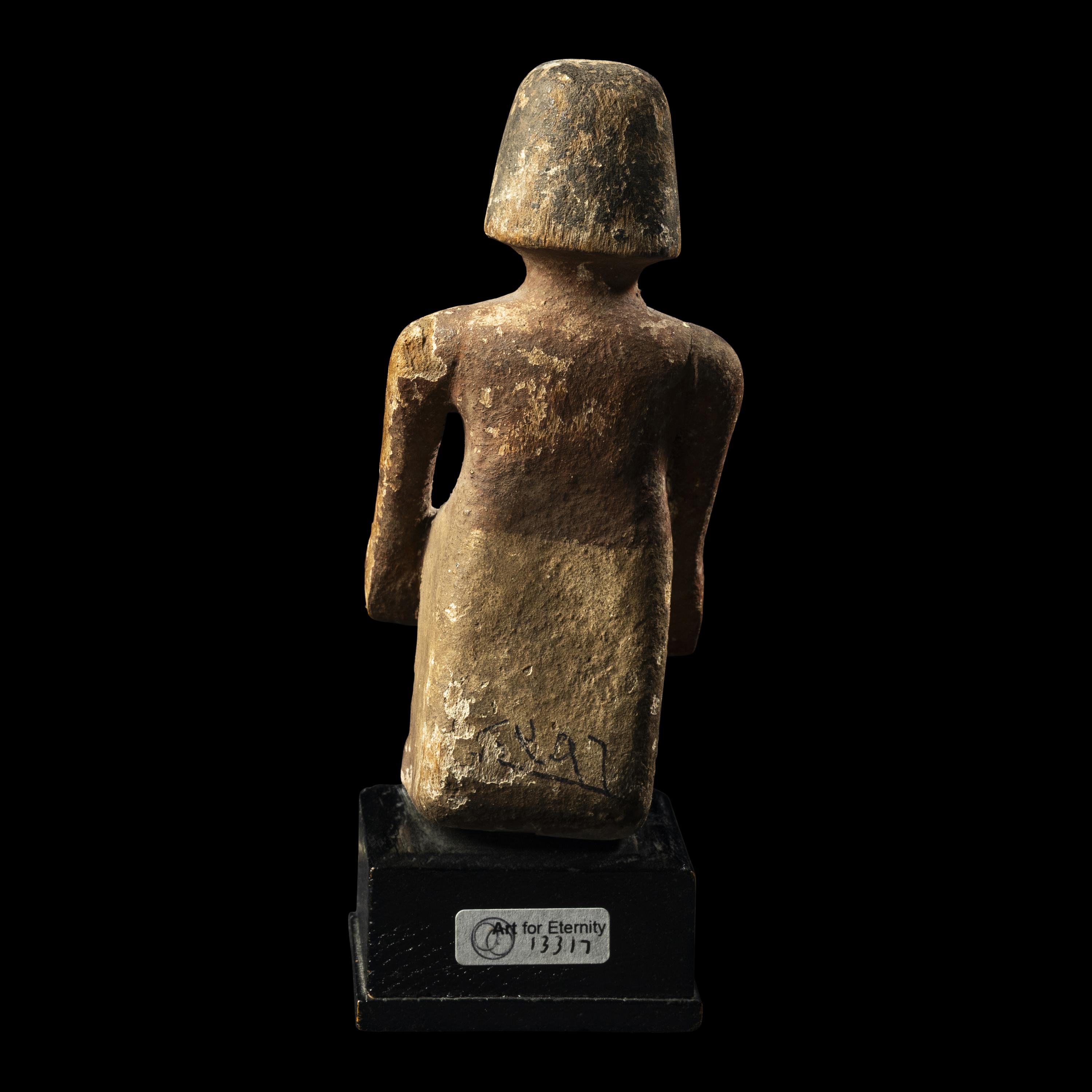 An Egyptian Painted Wood Boatman