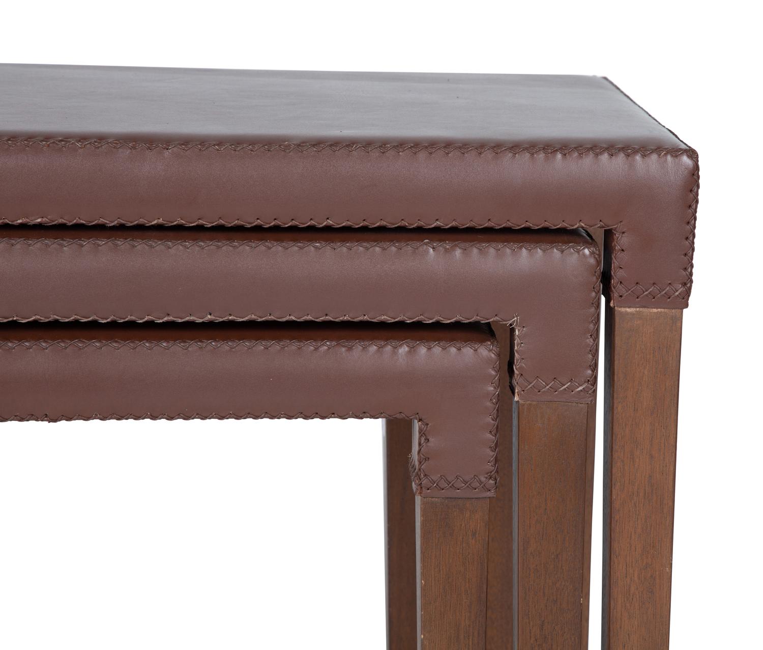 A Nest of Three Leather-Clad Occasional Tables — 20TH/21ST CENTURY