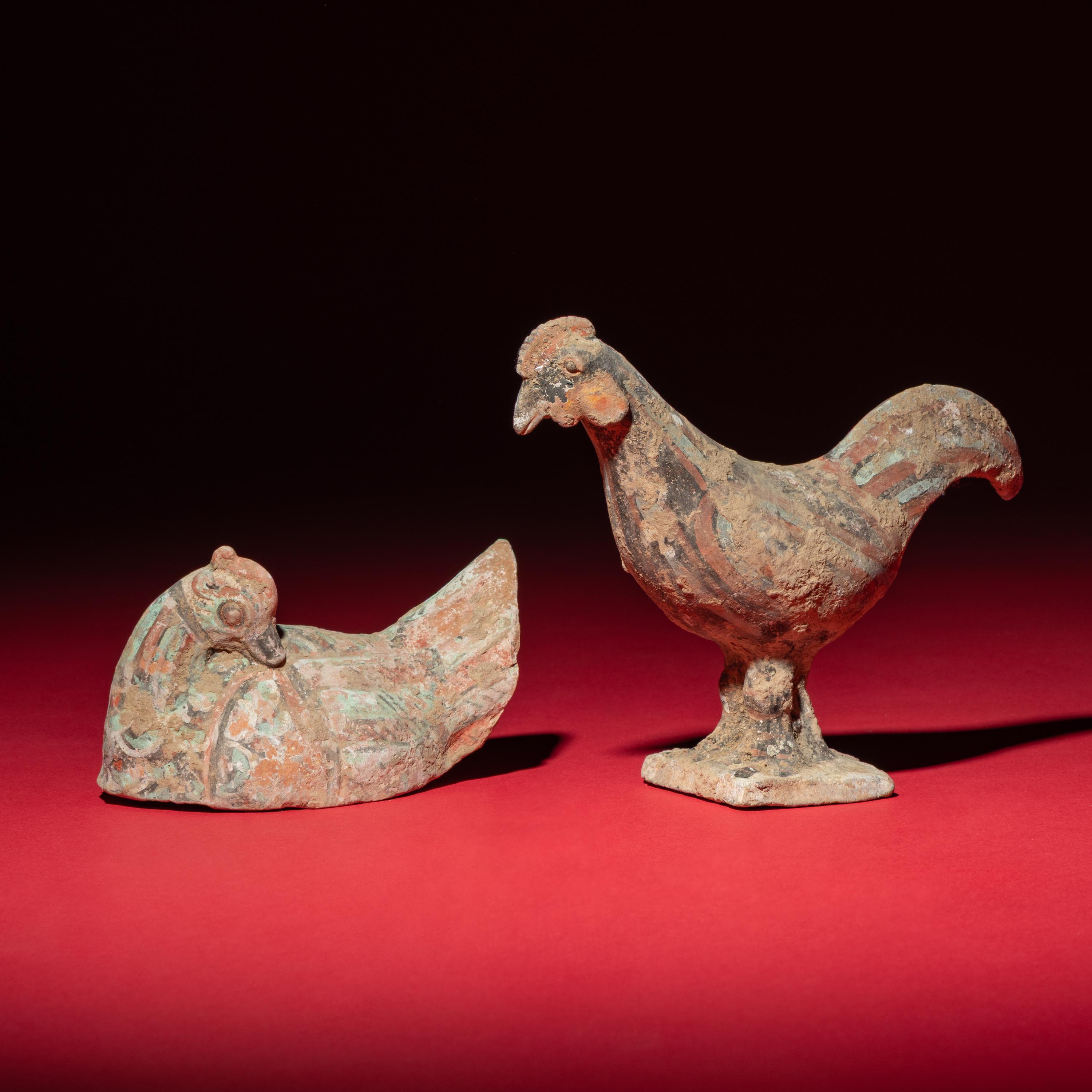 A Chinese Painted Pottery Mandarin Duck and a Cockerel, Han Dynasty — 漢 灰陶彩繪鴛鴦與小公雞