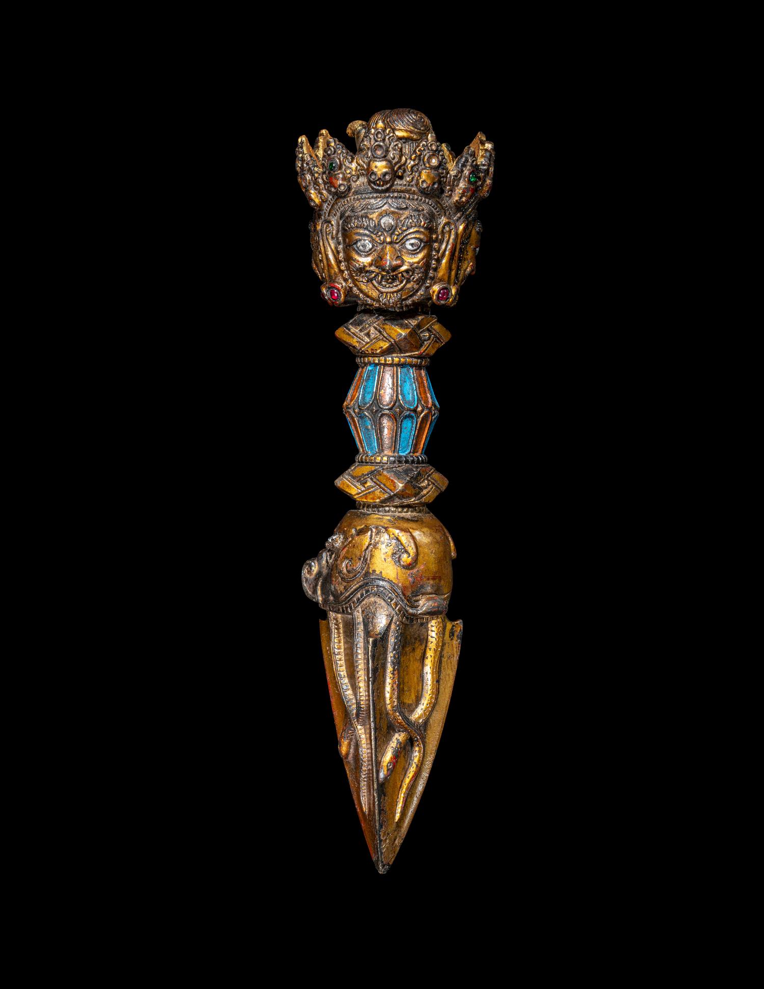 A Tibetan Gilt and Painted Bronze Vajra