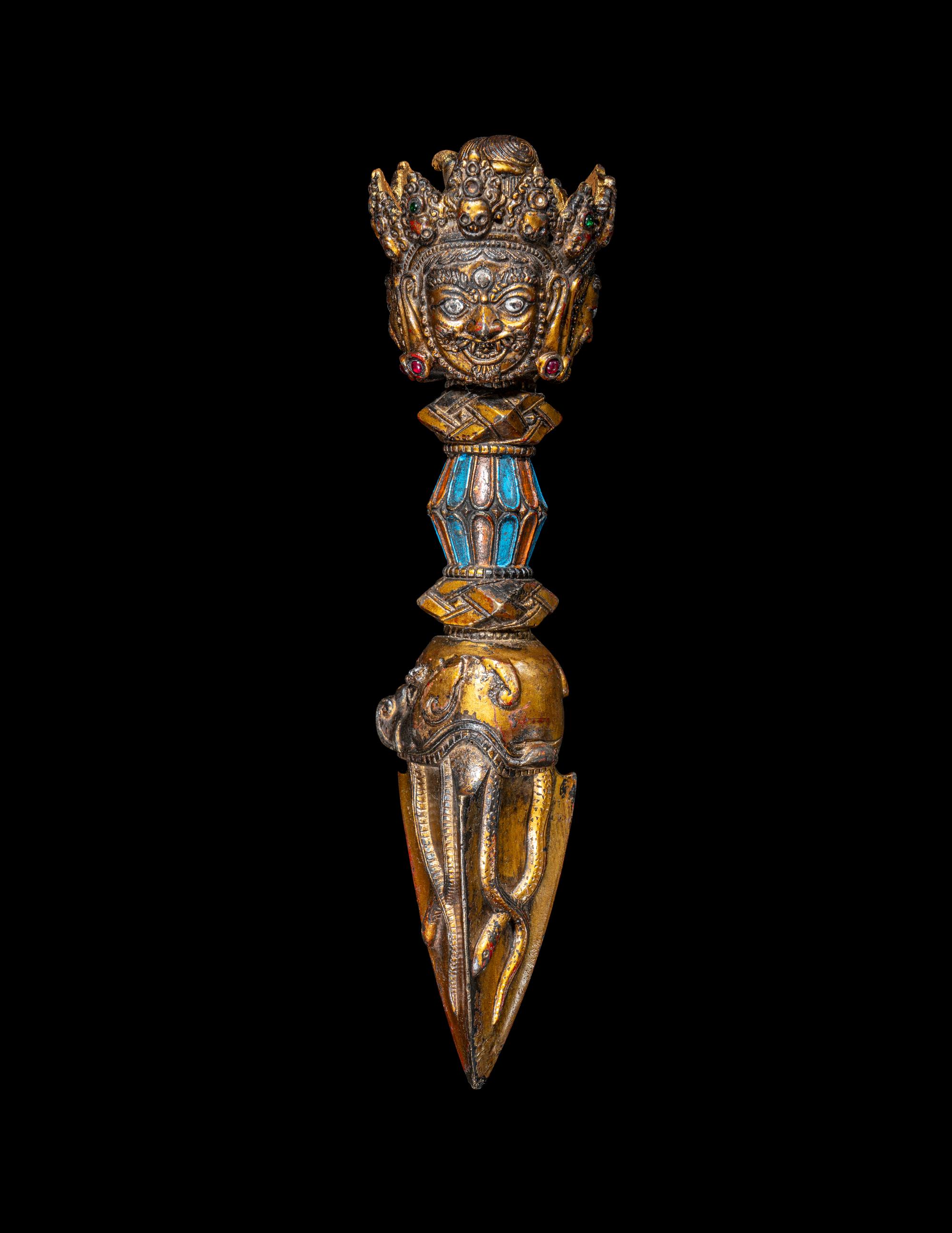 A Tibetan Gilt and Painted Bronze Vajra