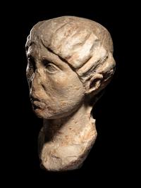 A Roman Marble Portrait Head of a Woman