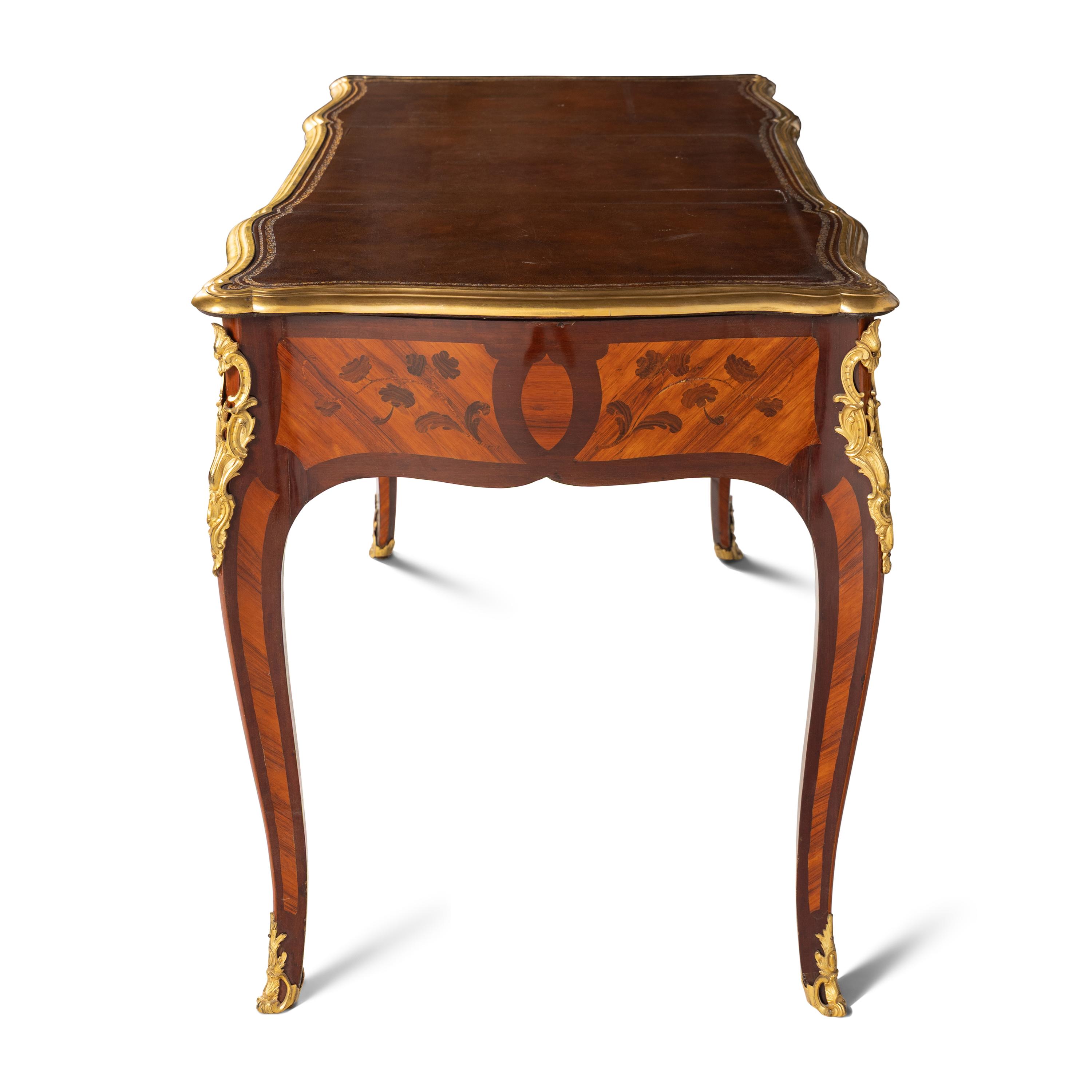 A Louis XV Gilt Bronze Mounted Tulipwood, Amaranth and Bois De Bout Marquetry Bureau Plat