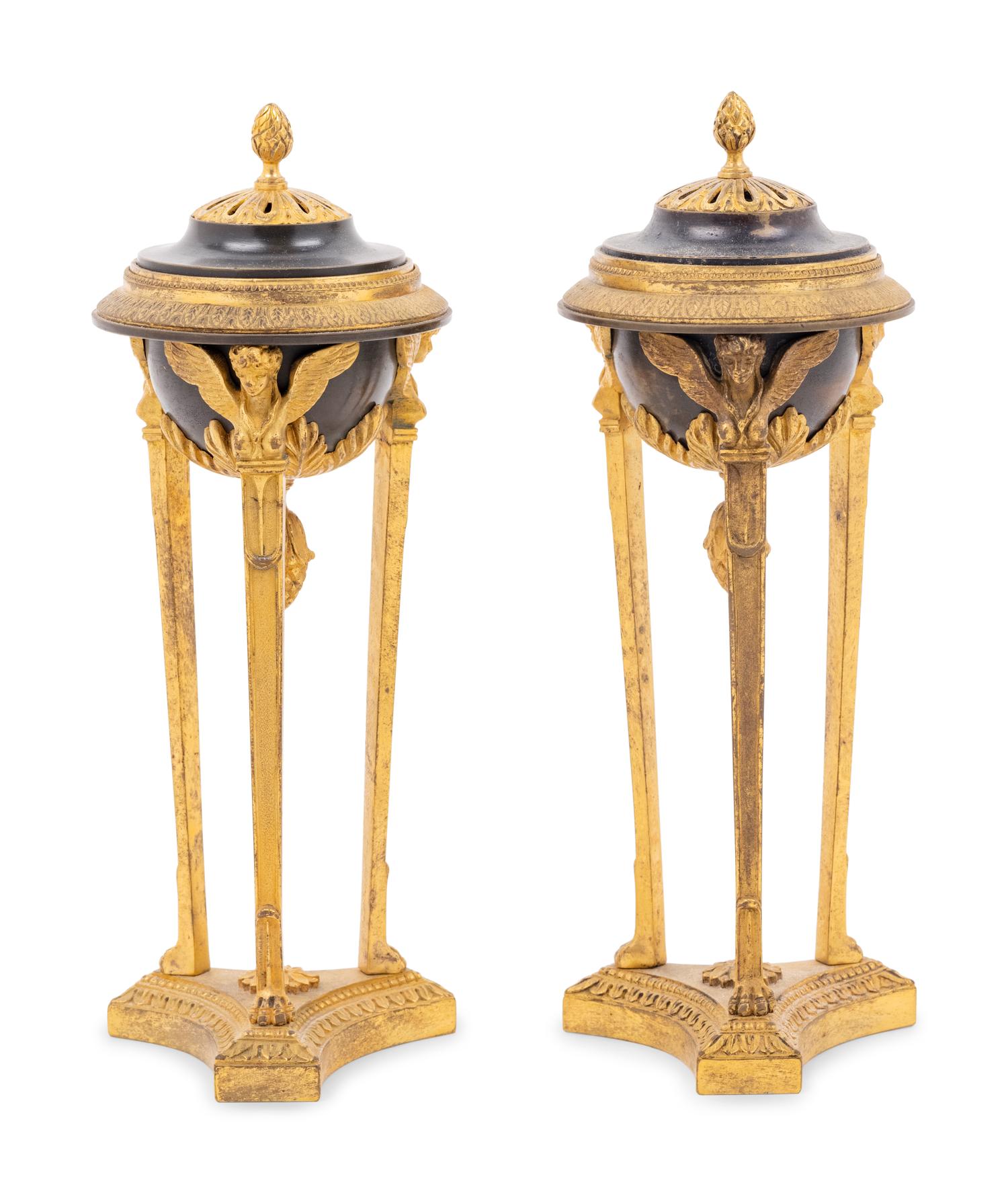 A Pair of Empire Style Gilt and Patinated Bronze Cassolettes