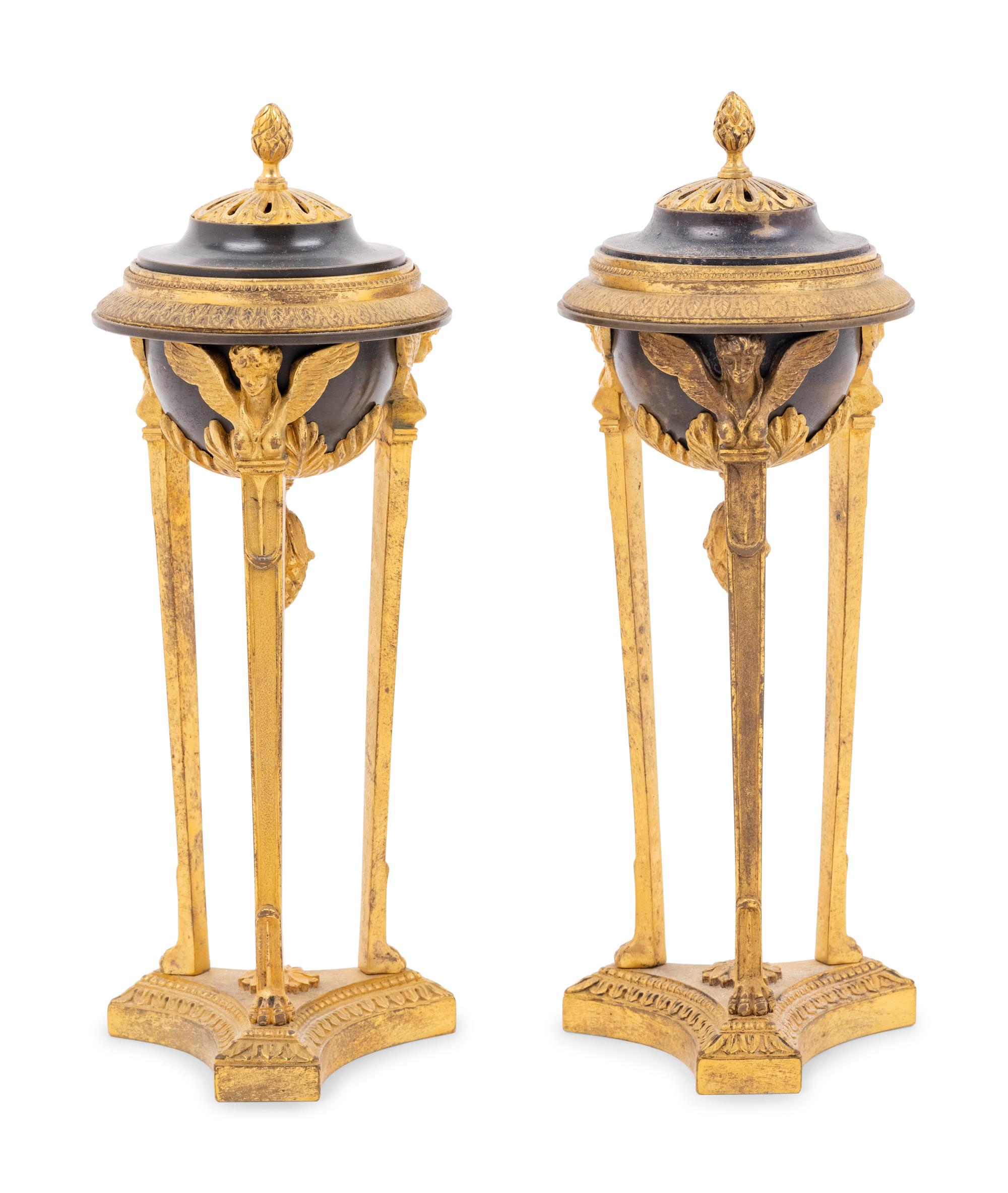A Pair of Empire Style Gilt and Patinated Bronze Cassolettes