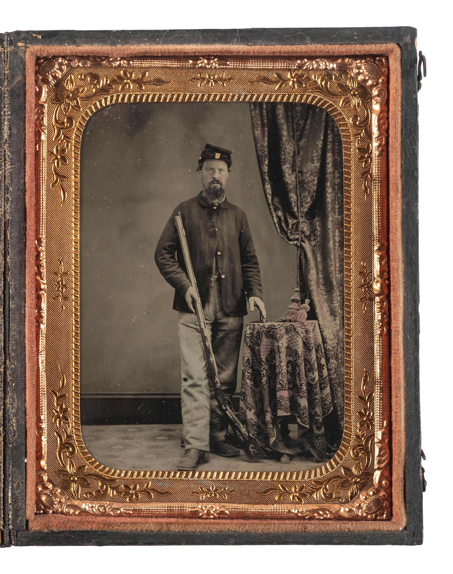 [CIVIL WAR]. Quarter plate tintype featuring a Union soldier with a civilian rifle.