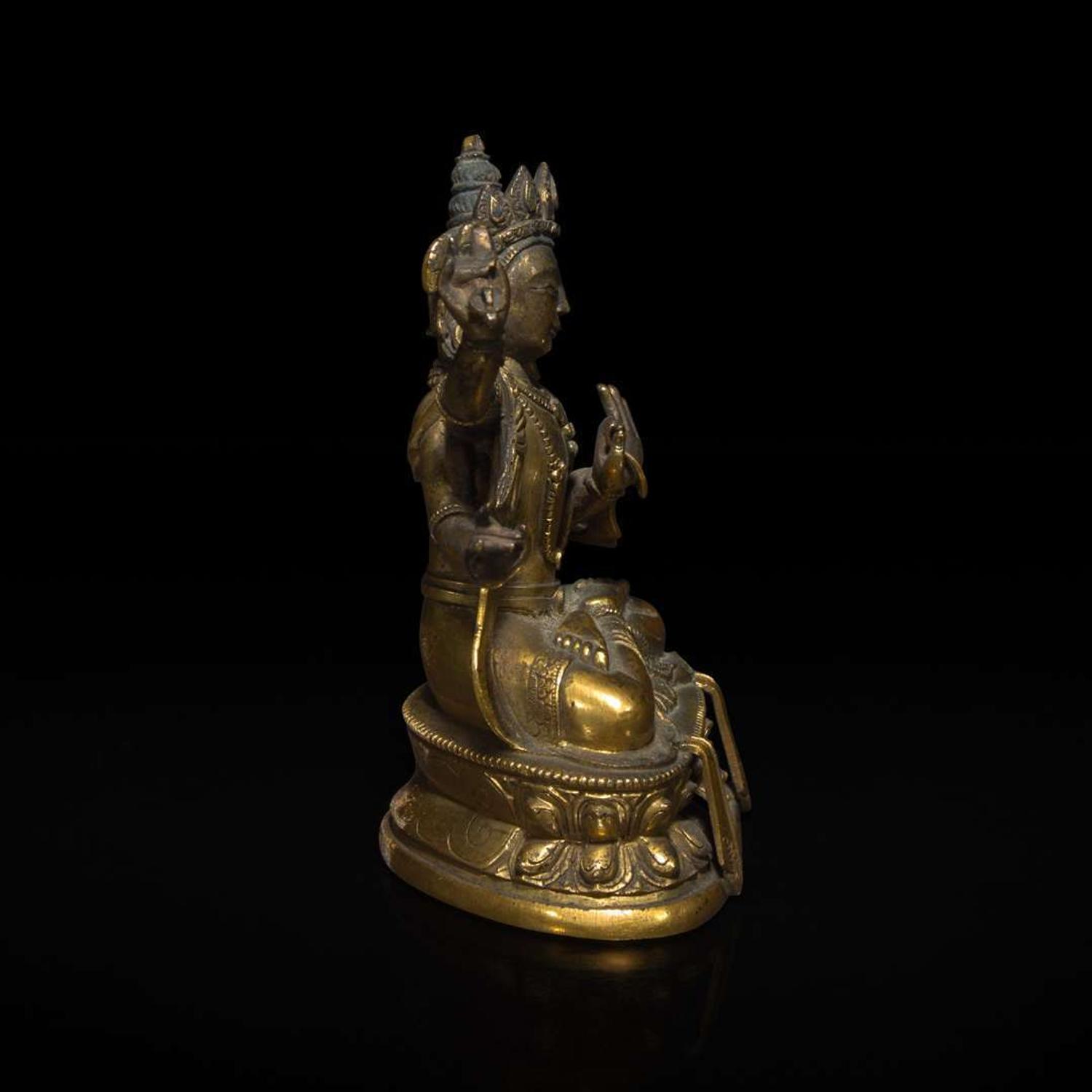 A small Sino-Tibetan gilt bronze figure of Manjusri 文殊菩萨铜鎏金造像 18th century ????