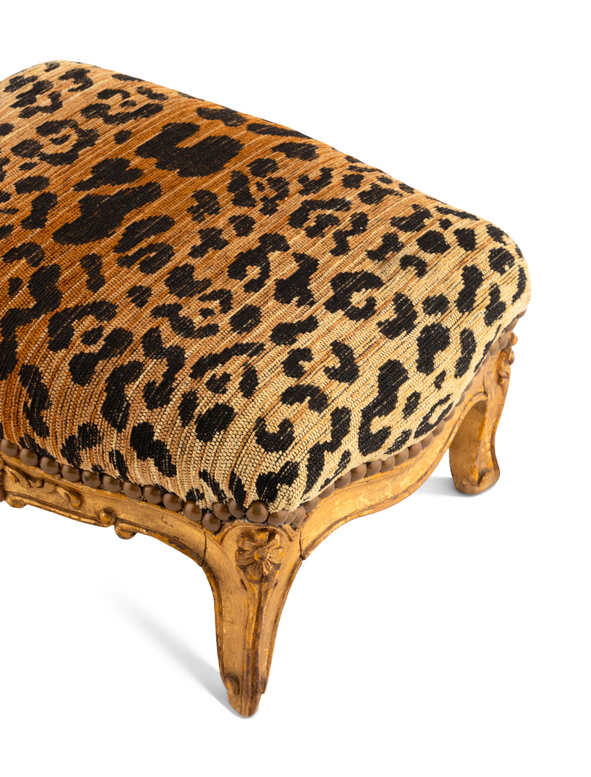 A Near Pair of Louis XV Giltwood Tabourets