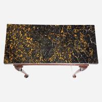 A George II rectangular carved walnut side table with Portoro marble top mid-18th century