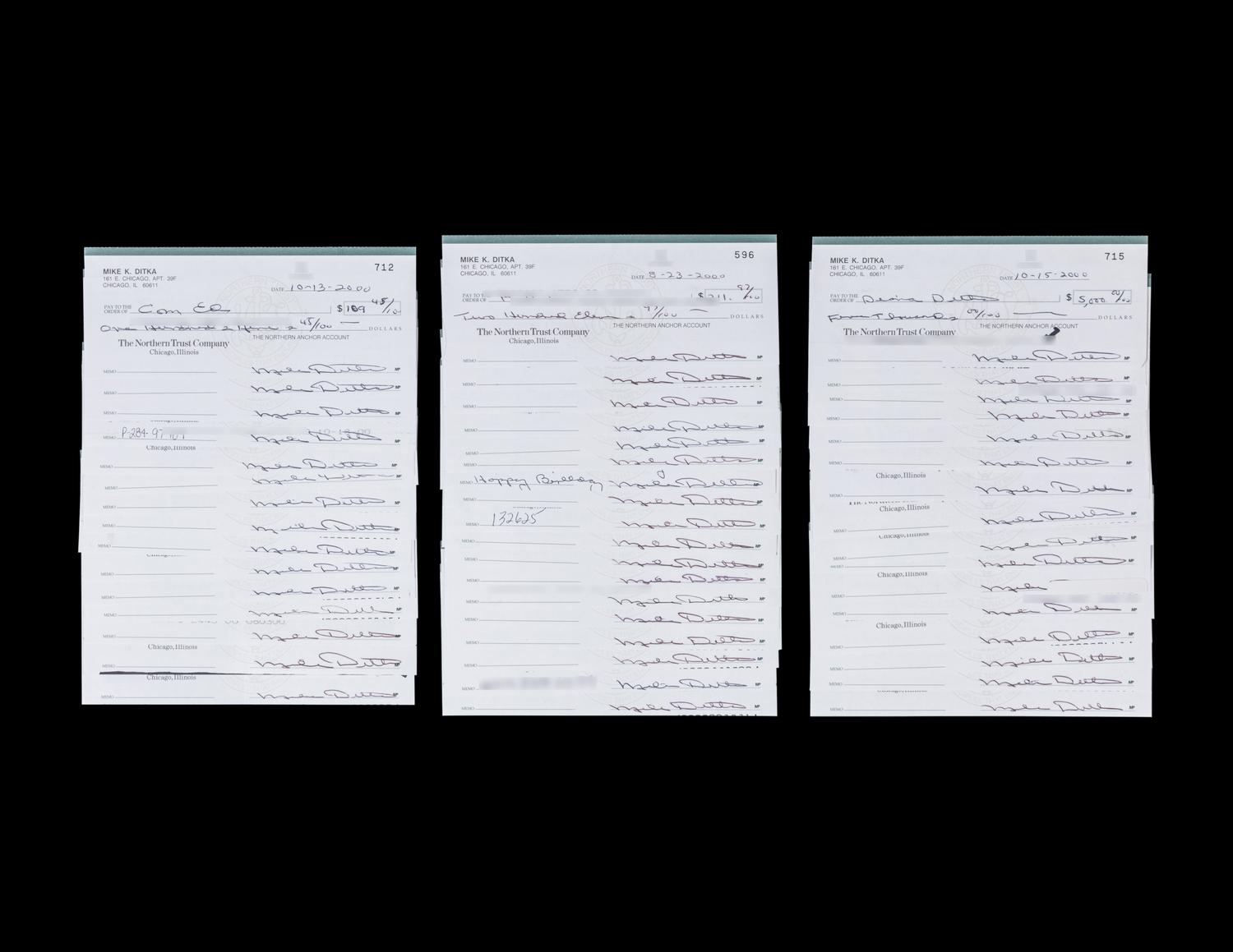 A Group of 50 Mike Ditka Signed Autograph Personal Checks
