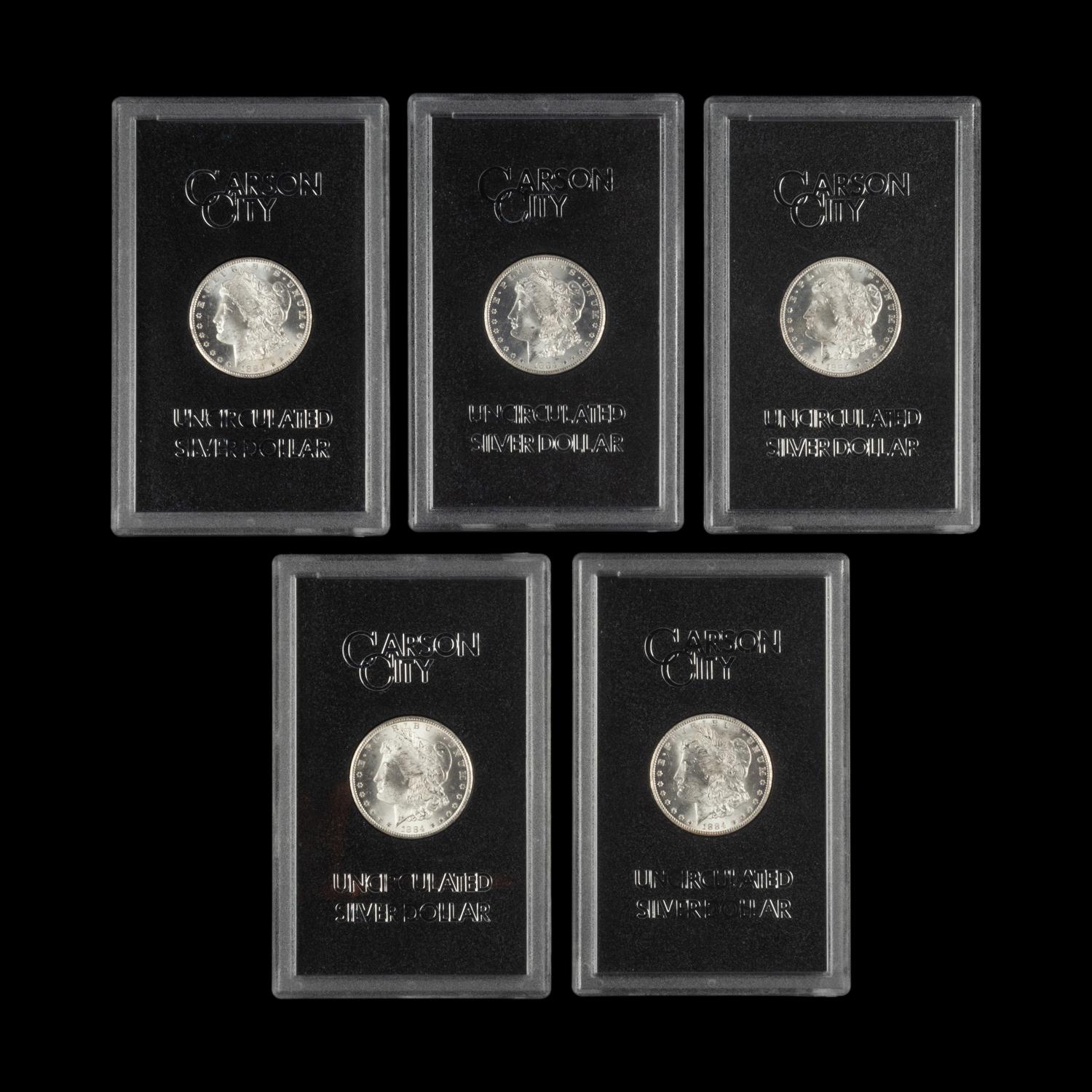 A Group of Five 1884-CC GSA: Morgan $1 Coins