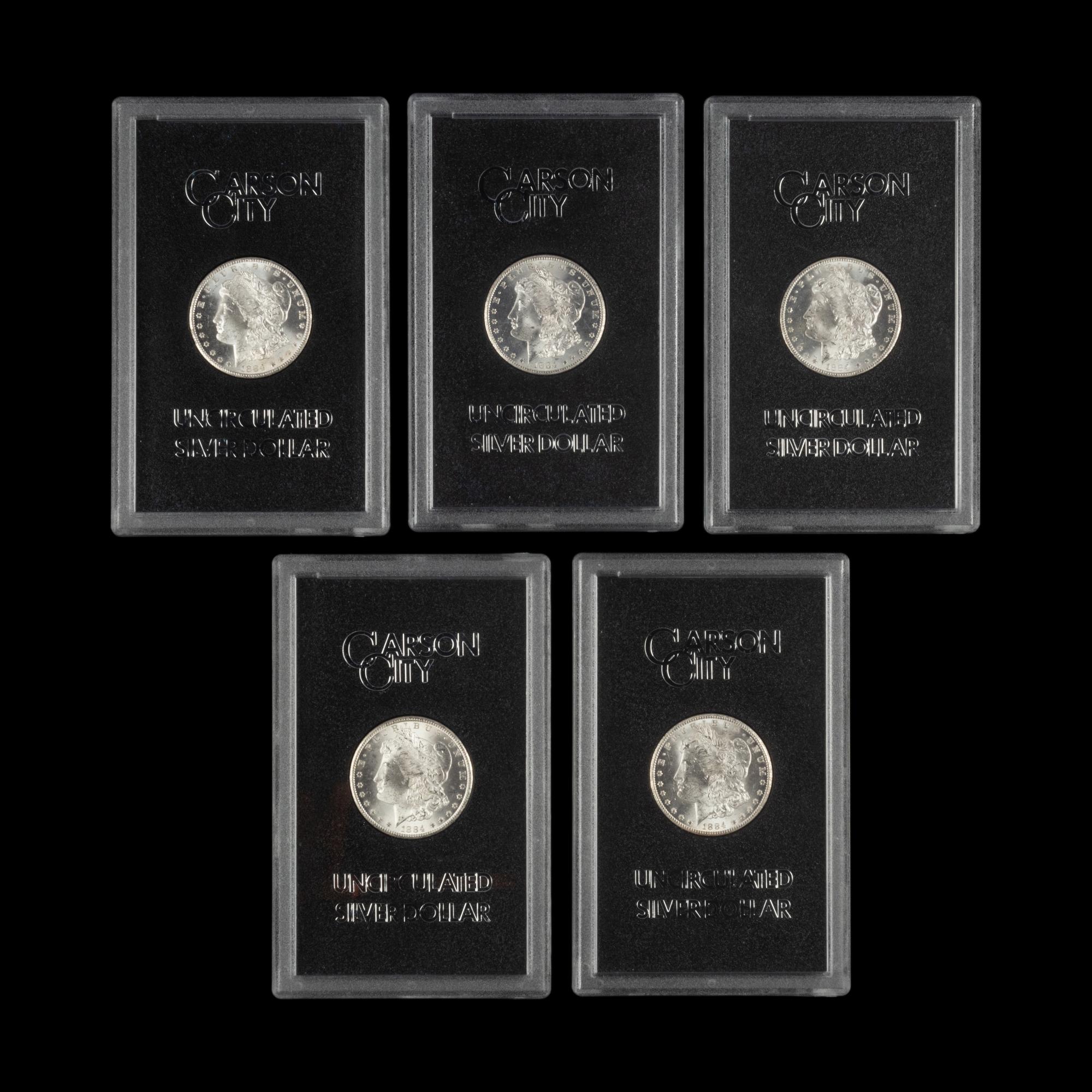A Group of Five 1884-CC GSA: Morgan $1 Coins
