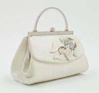 A Judith Leiber Cream Crocodile Handbag, 6.5" x 5" x 4".