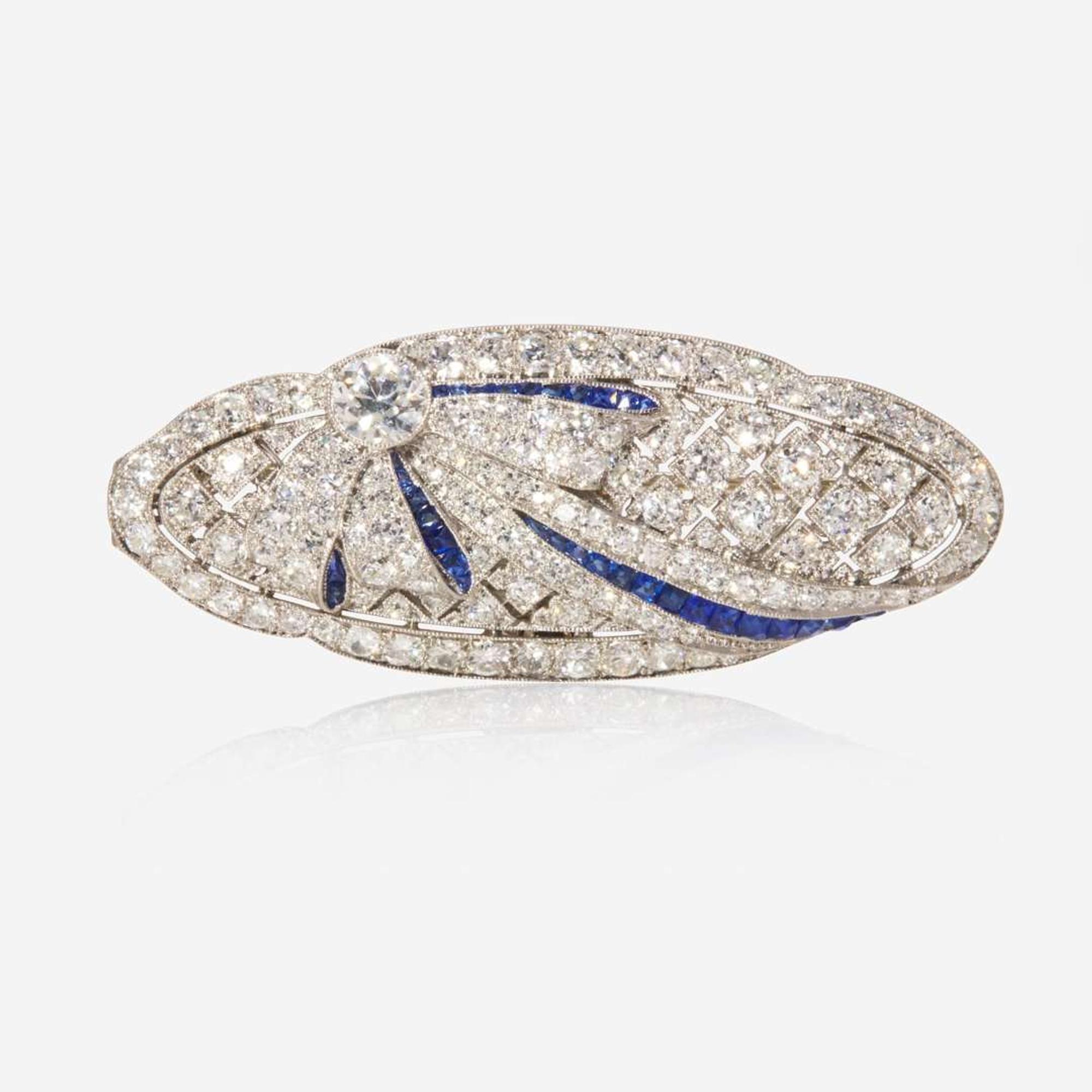 A Platinum, Diamond, and Sapphire Brooch