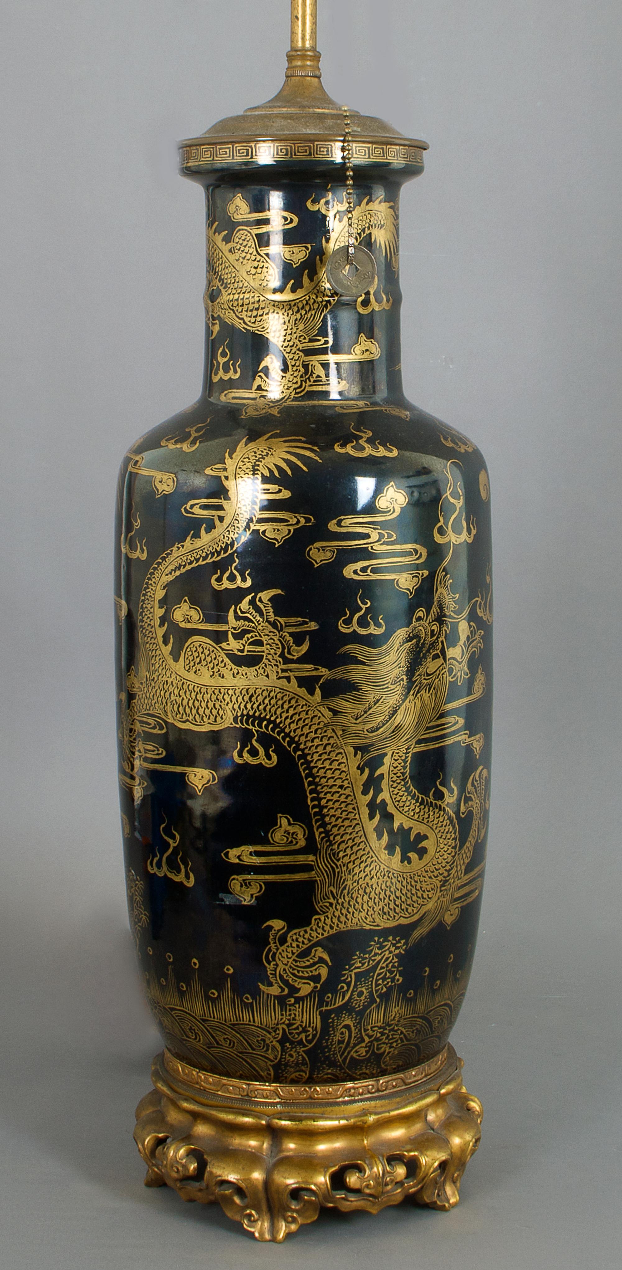 A Chinese Porcelain Rouleau Vase, Height overall 32 1/2 inches.