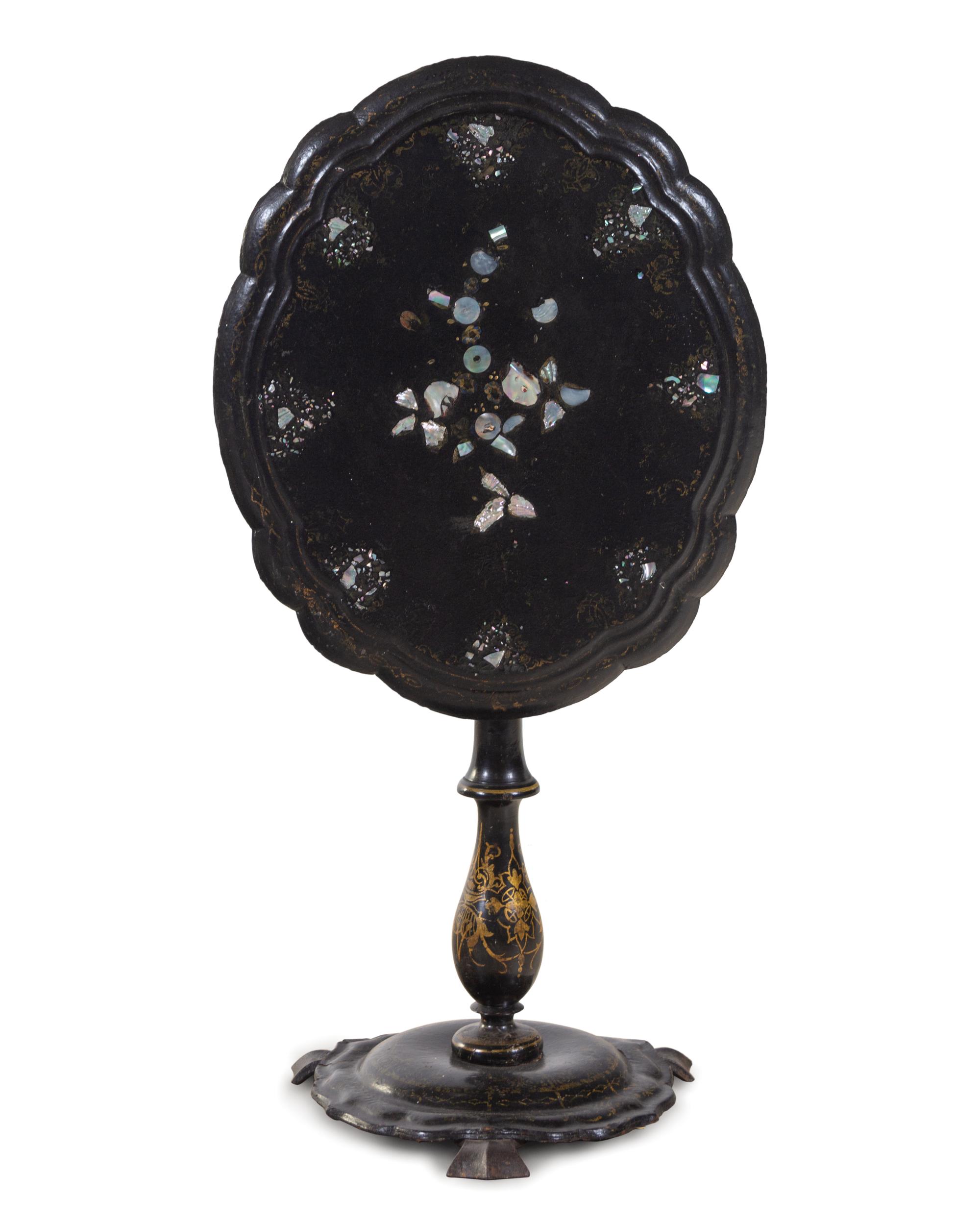A Victorian Lacquered and Mother-of-Pearl Inlaid Tilt-Top Table