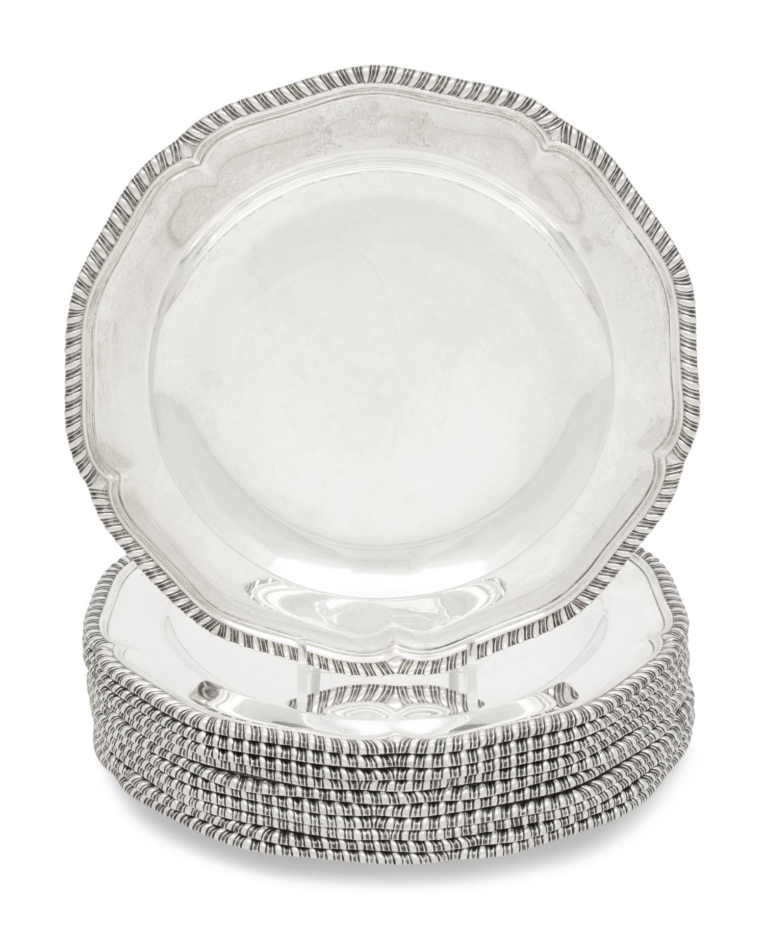 A Set of Twelve George III Silver Dinner Plates