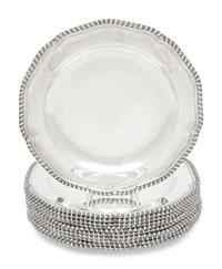 A Set of Twelve George III Silver Dinner Plates