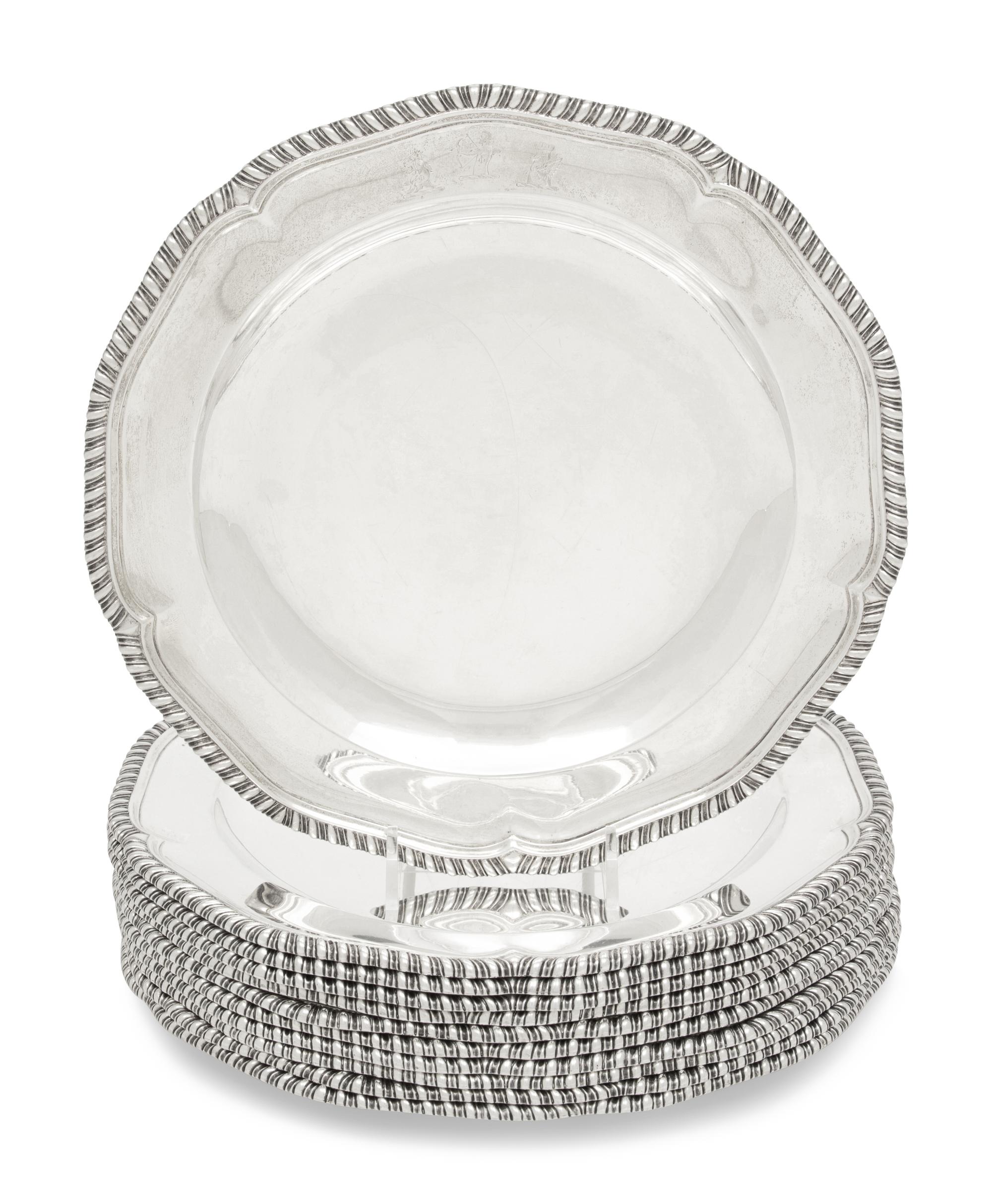 A Set of Twelve George III Silver Dinner Plates