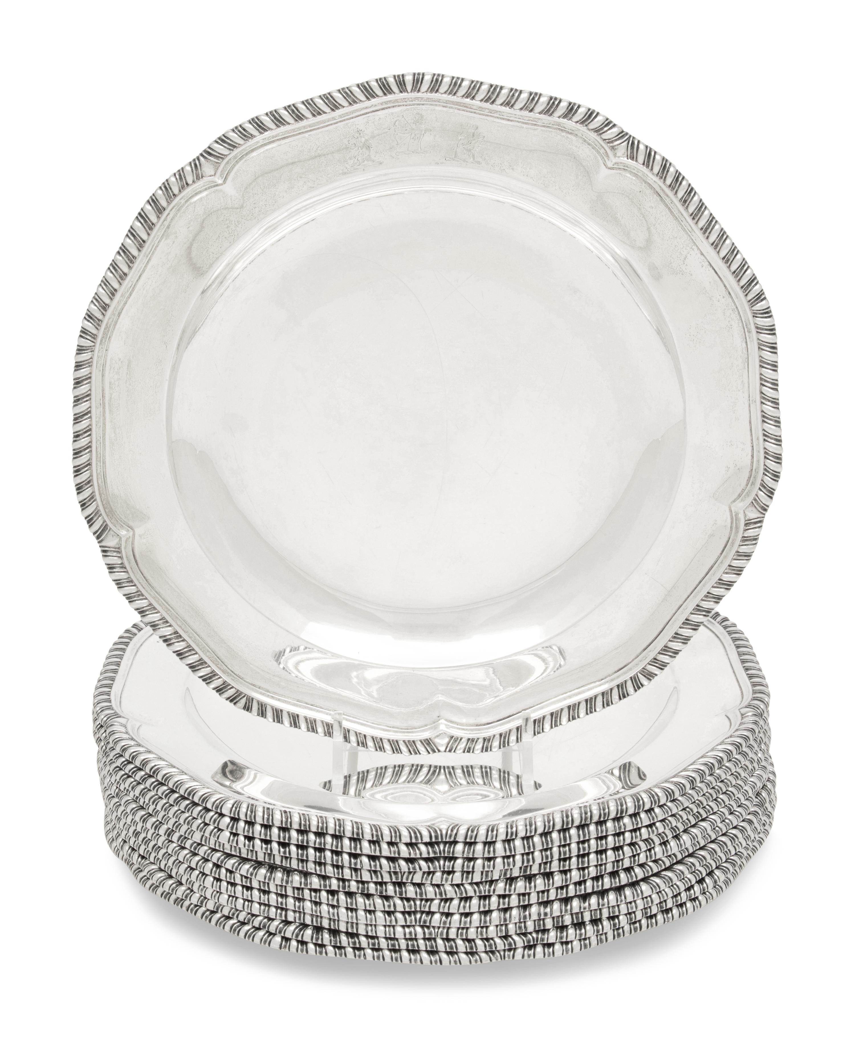A Set of Twelve George III Silver Dinner Plates