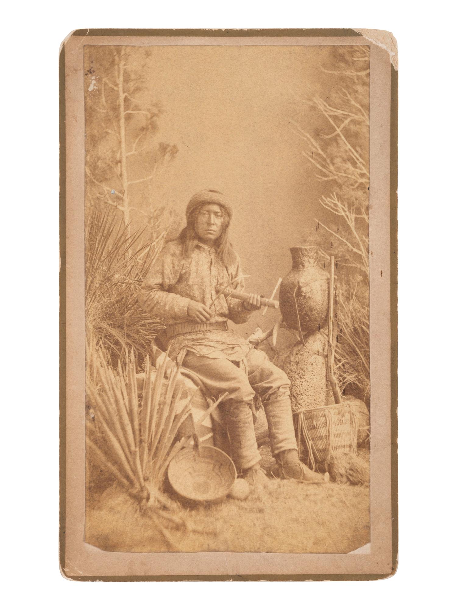 [NATIVE AMERICANS]. A group of 2 photographs of Apache subjects by Ben WITTICK and A. Frank RANDALL. Ca 1880s.