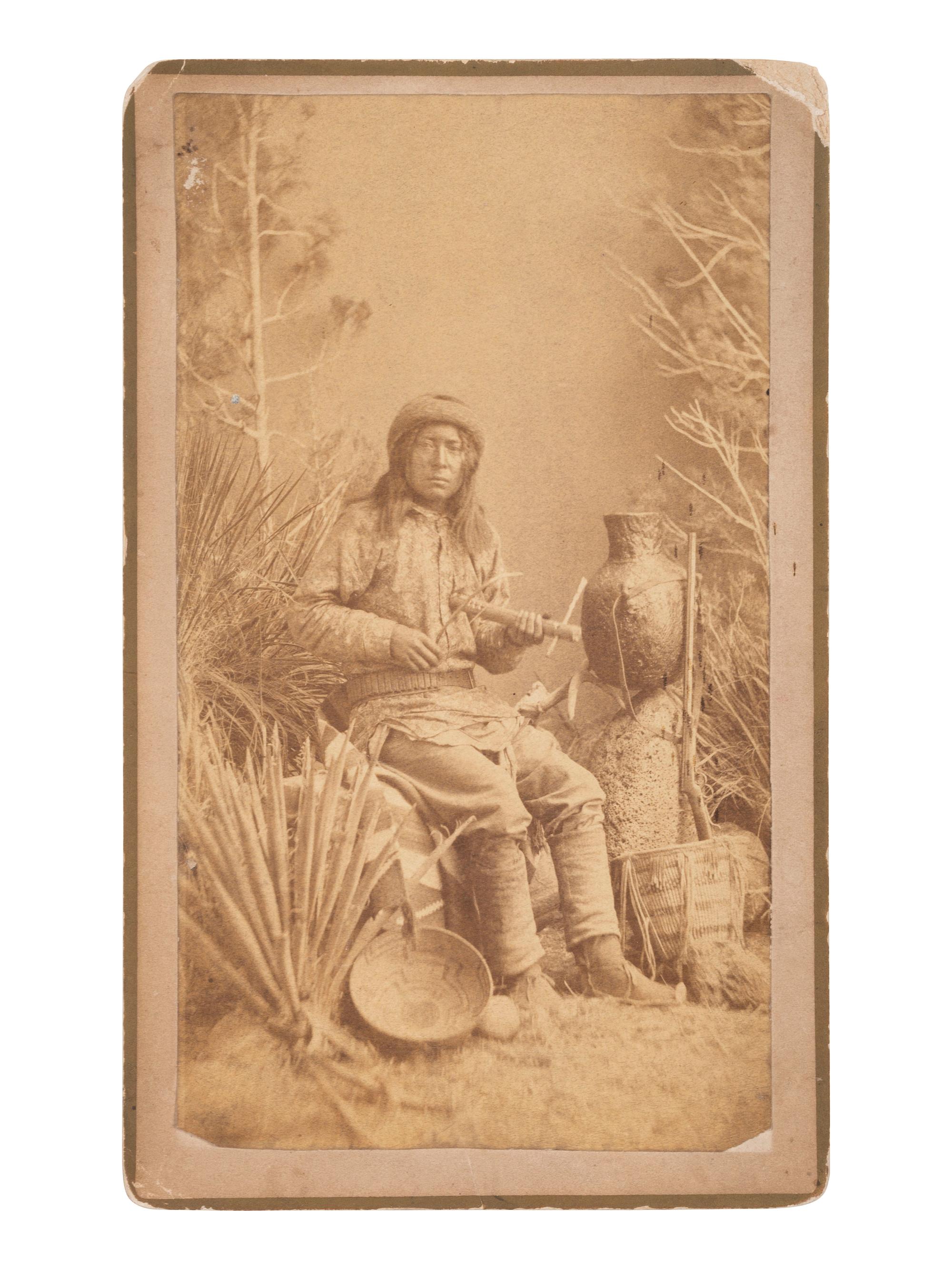 [NATIVE AMERICANS]. A group of 2 photographs of Apache subjects by Ben WITTICK and A. Frank RANDALL. Ca 1880s.